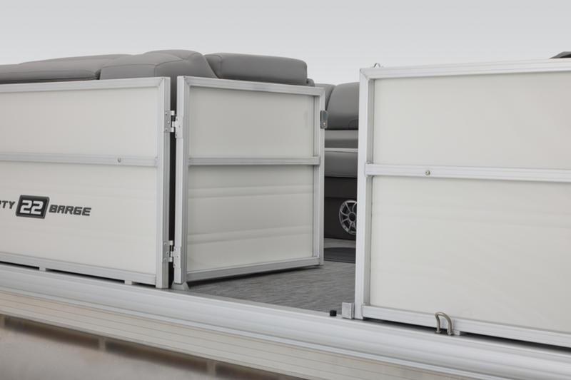 2026 Sun Tracker Party Barge 22 DLX pontoon boat with open side gate.