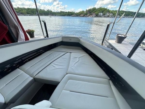 Luxurious interior of 2022 Cobalt A36BR boat with waterfront view.