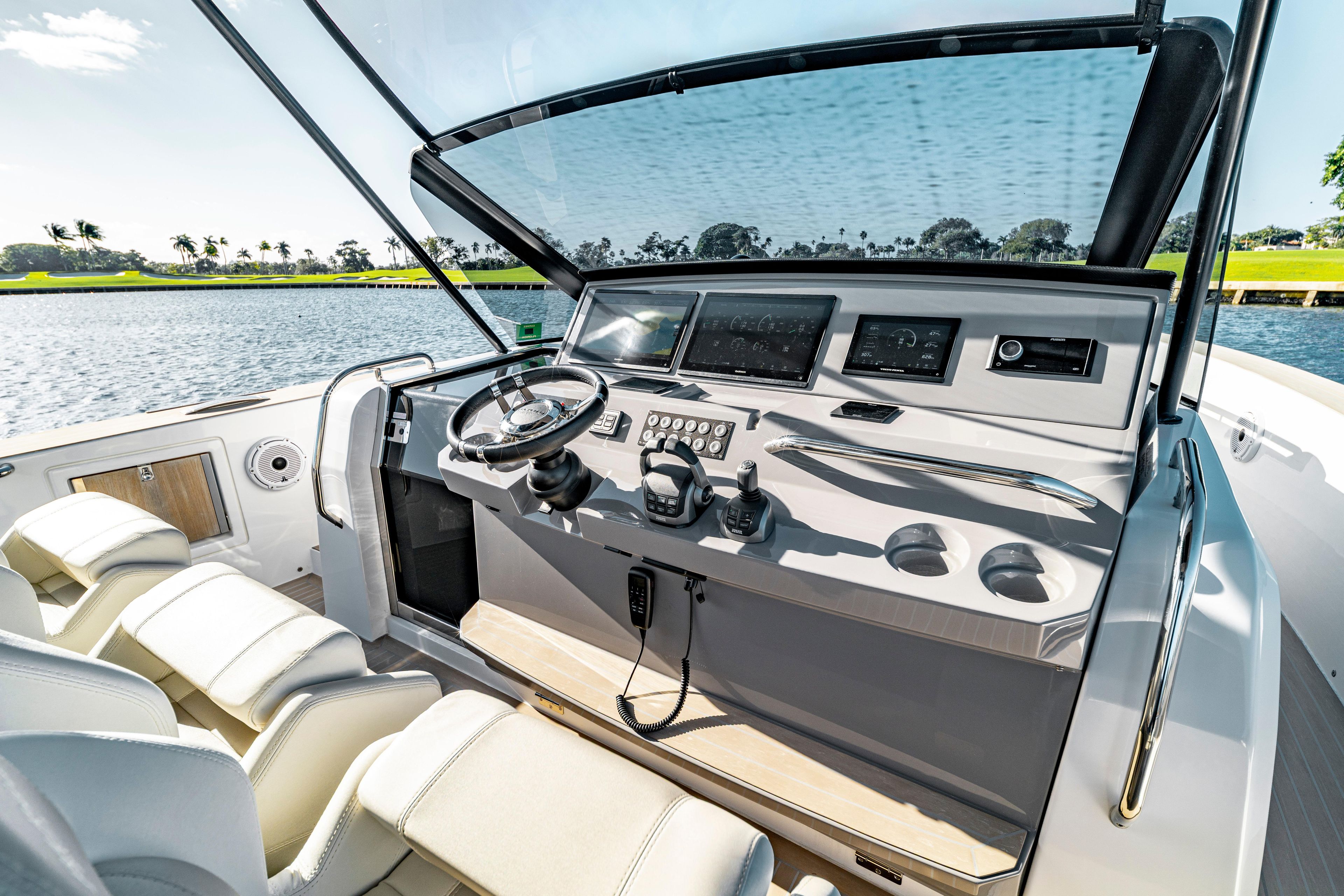 2024 Pardo Yachts P43 helm with modern controls and scenic water view.
