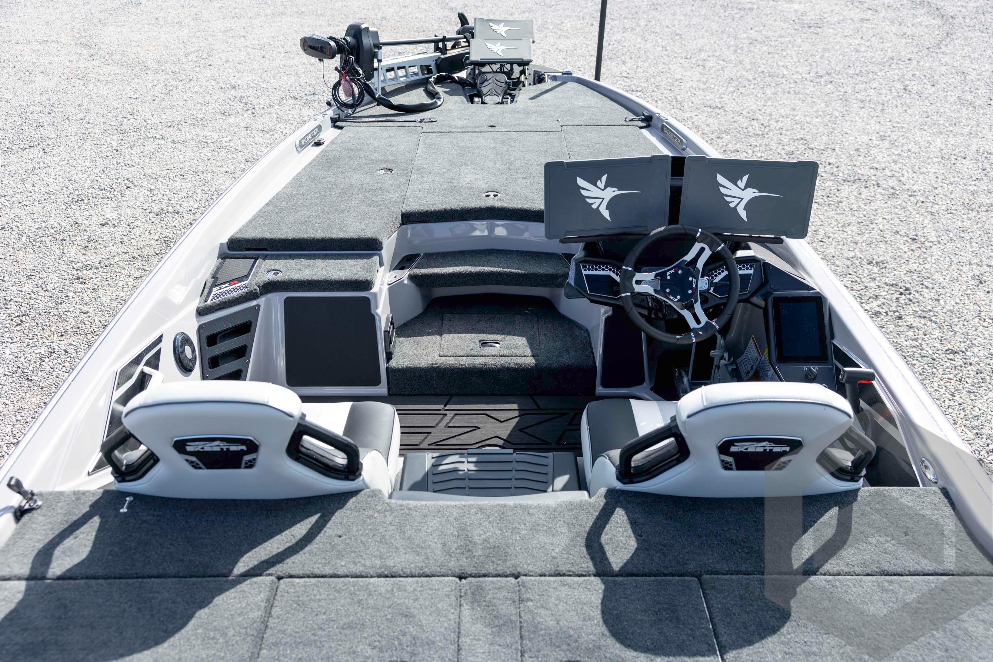 2026 Skeeter FXR20 FLEX boat interior with dual screens and steering wheel.