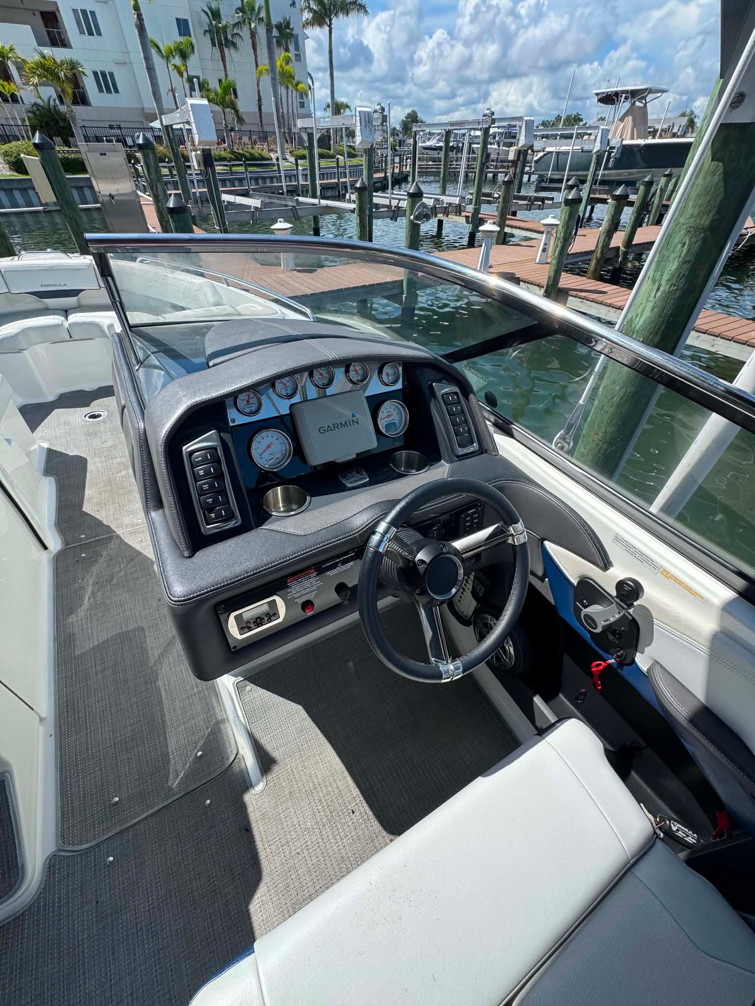 Interior view of a 2018 Formula 270 Bowrider boat at the dock.