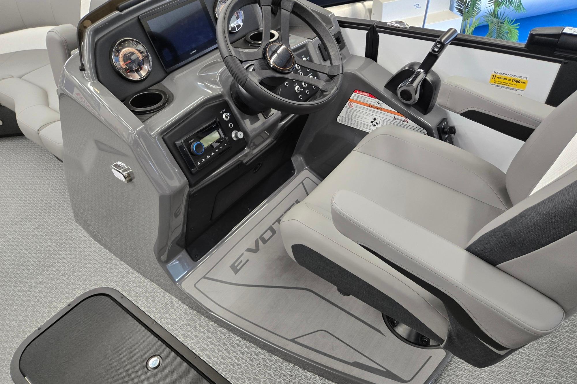 Cockpit of 2026 Evotti 521CS boat with modern controls and comfortable seating.