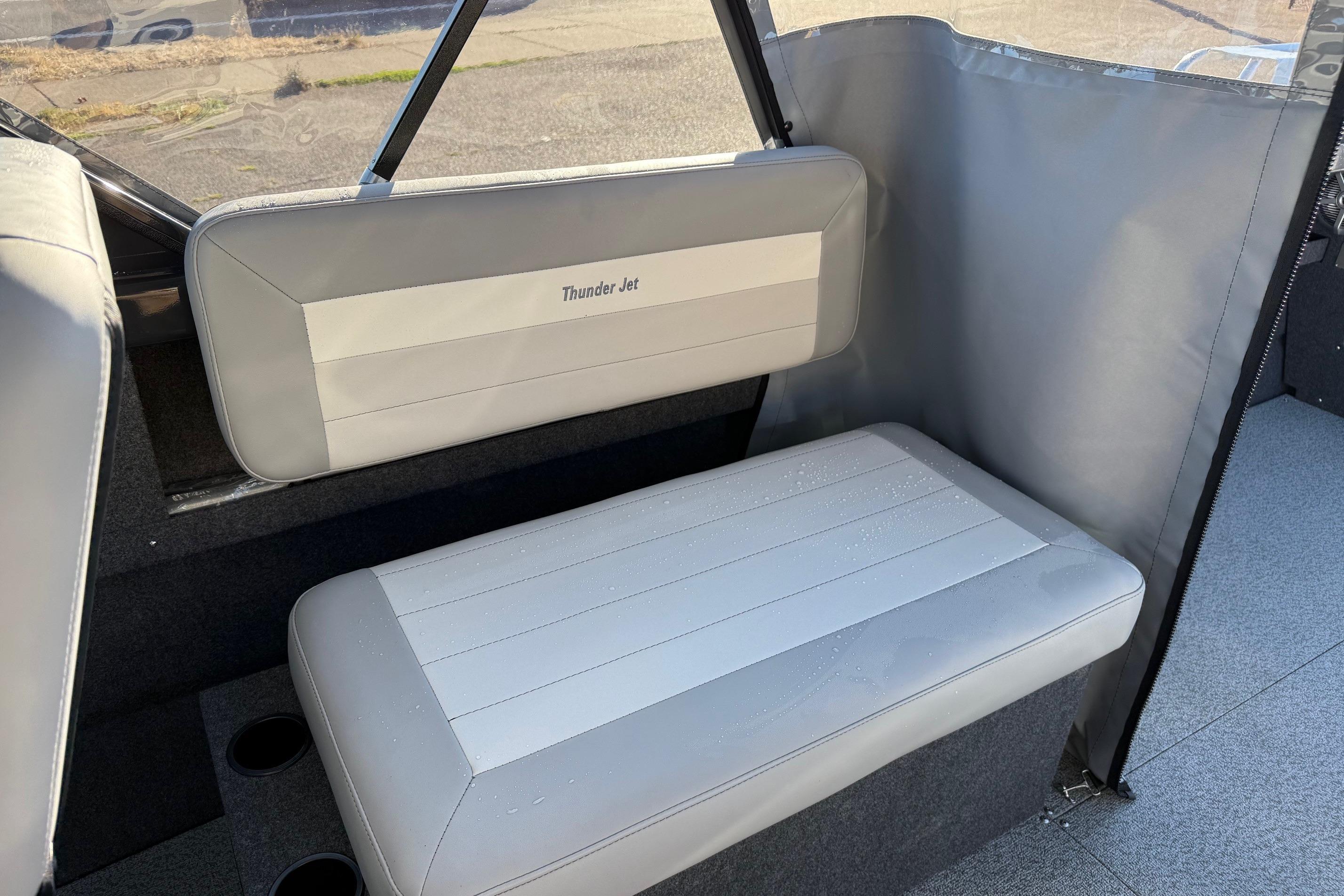 Interior seating of 2026 Thunder Jet 200 Luxor boat with gray upholstery.