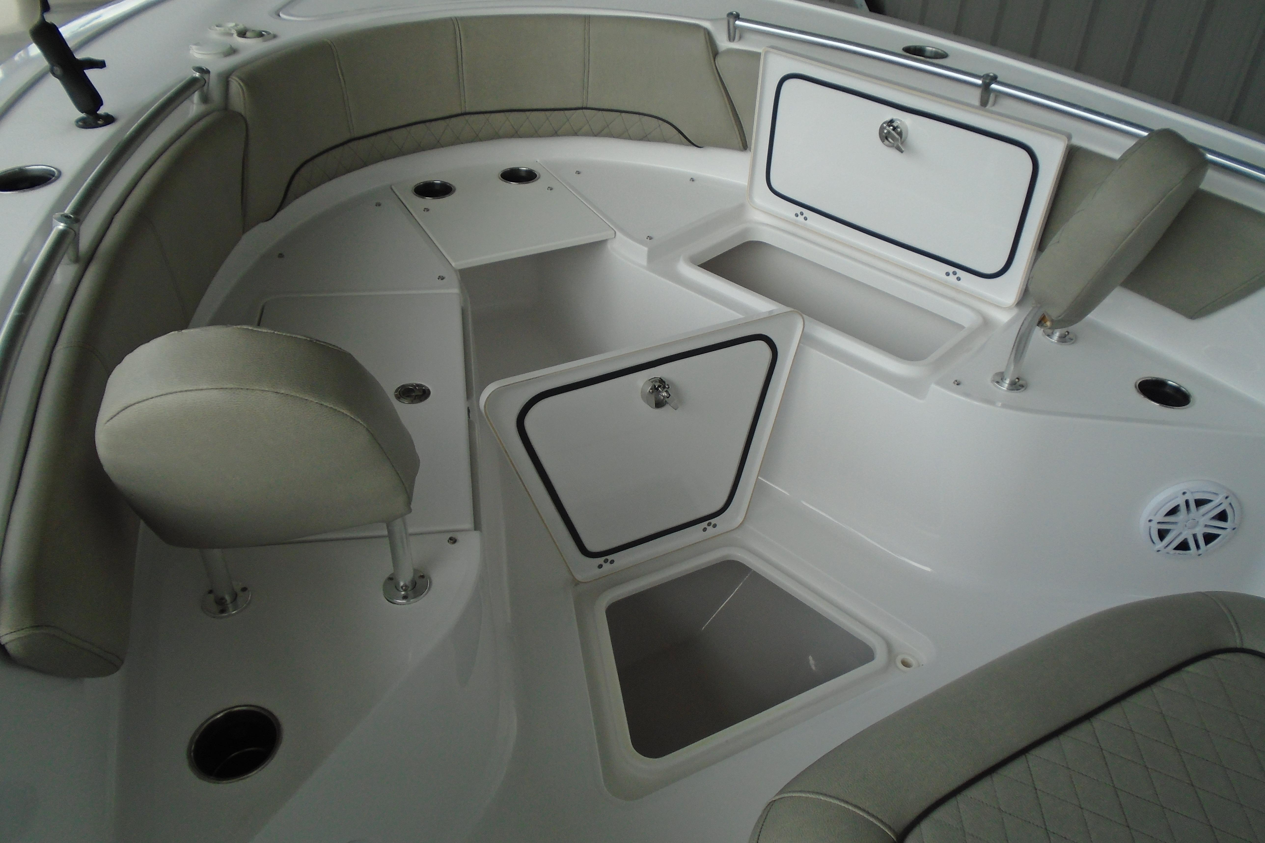 2022 Sportsman Heritage 241 Center Console boat interior with storage compartments.