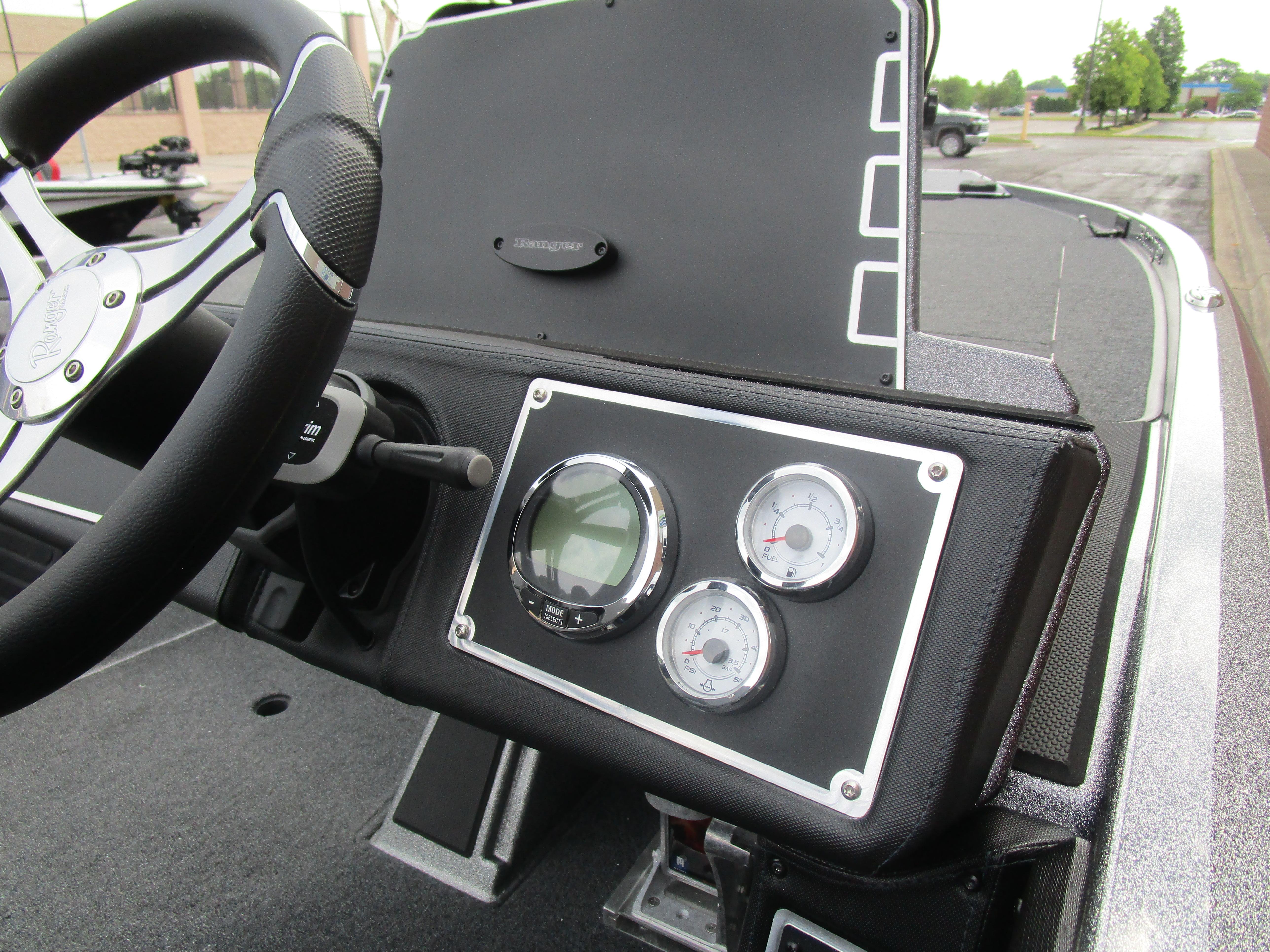 2025 Ranger Z520 boat dashboard with steering wheel and gauges.