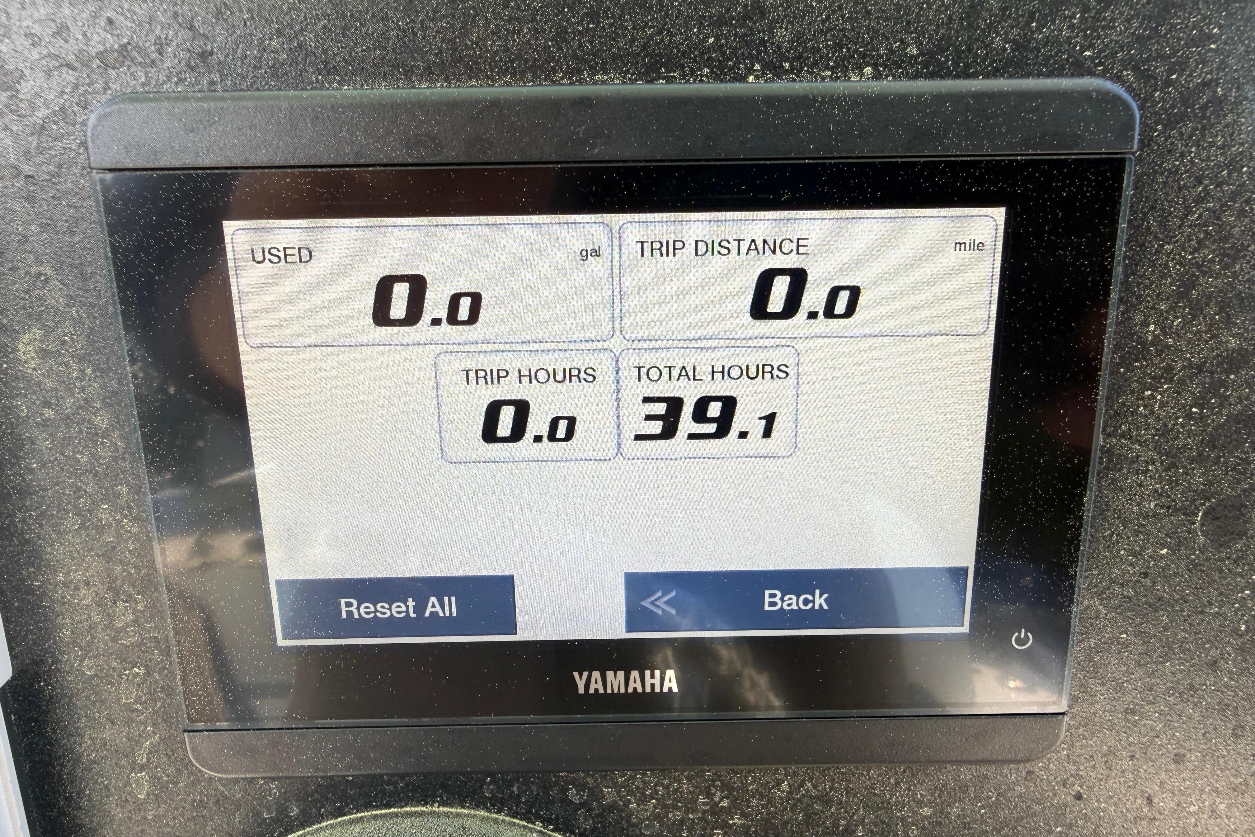 Yamaha display on 2023 Robalo 246 Cayman showing trip and total hours.