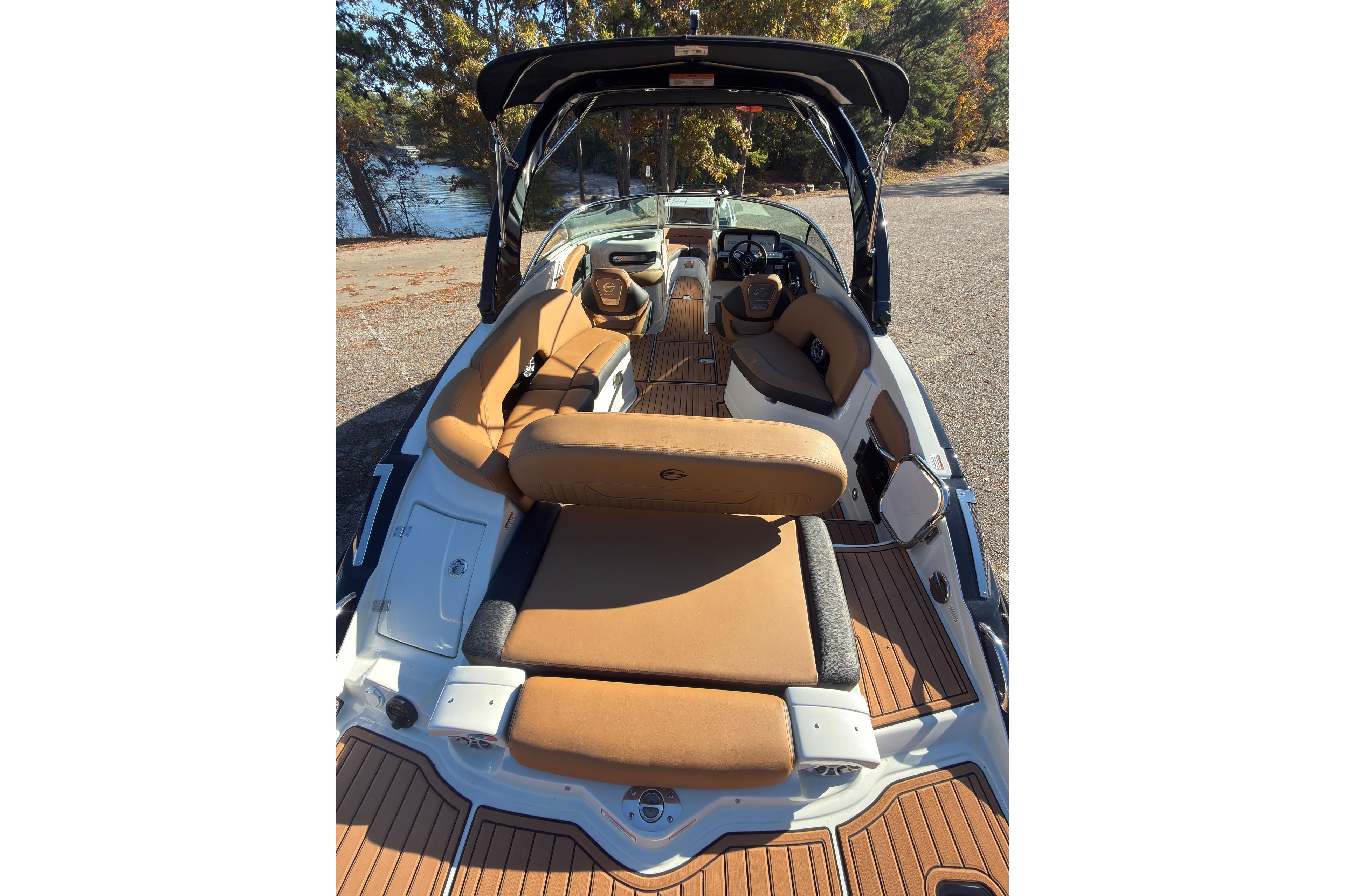 2026 Crownline 298 SS boat interior with tan seating and sleek design.