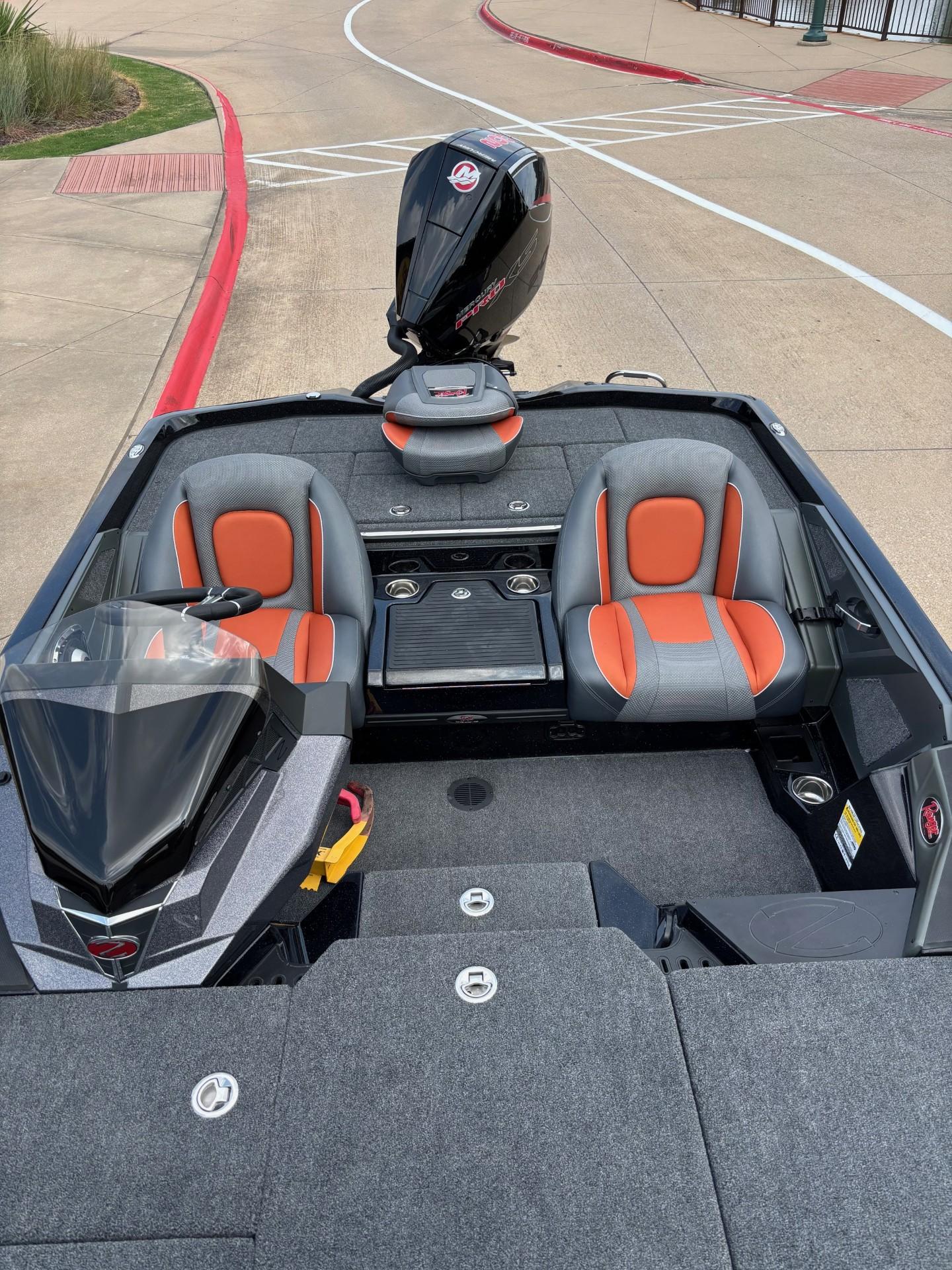 2025 Ranger Z518 Cup-Equipped boat with orange and gray seating, sleek design.