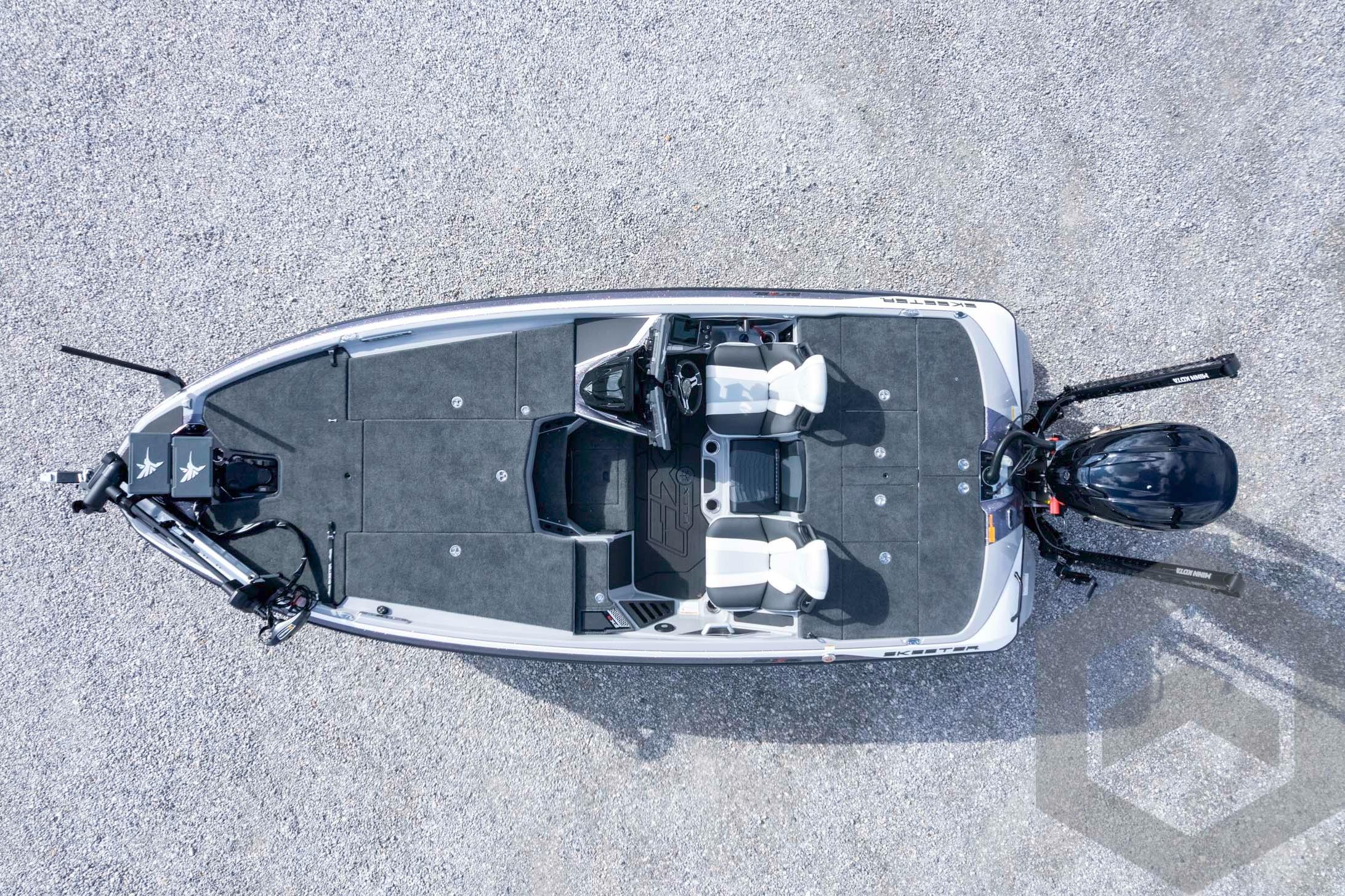 Overhead view of 2026 Skeeter FXR20 FLEX boat on gravel surface.