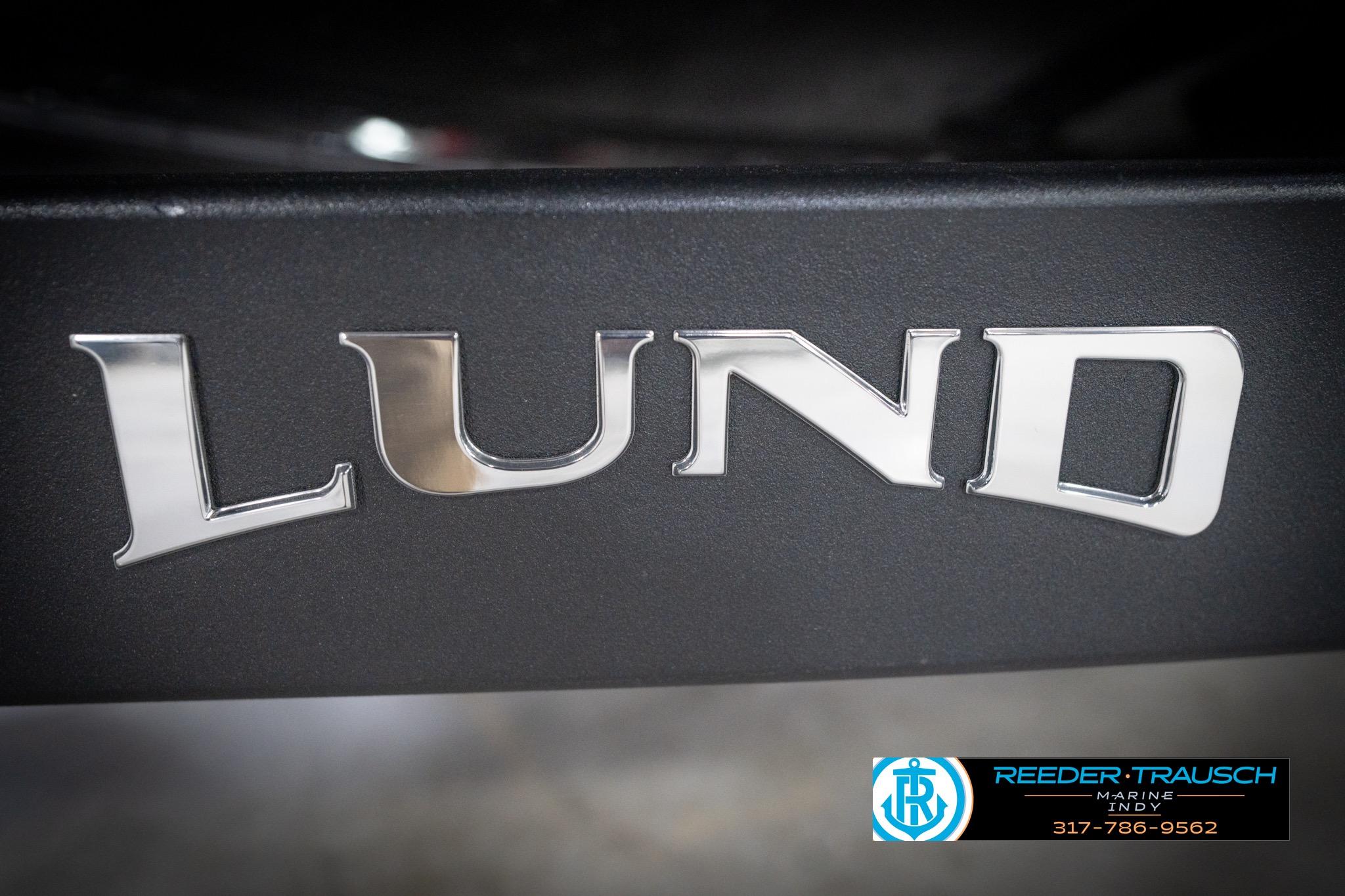 Chrome "Lund" logo on 2026 Lund 2275 Baron boat, Reeder-Trausch Marine branding.