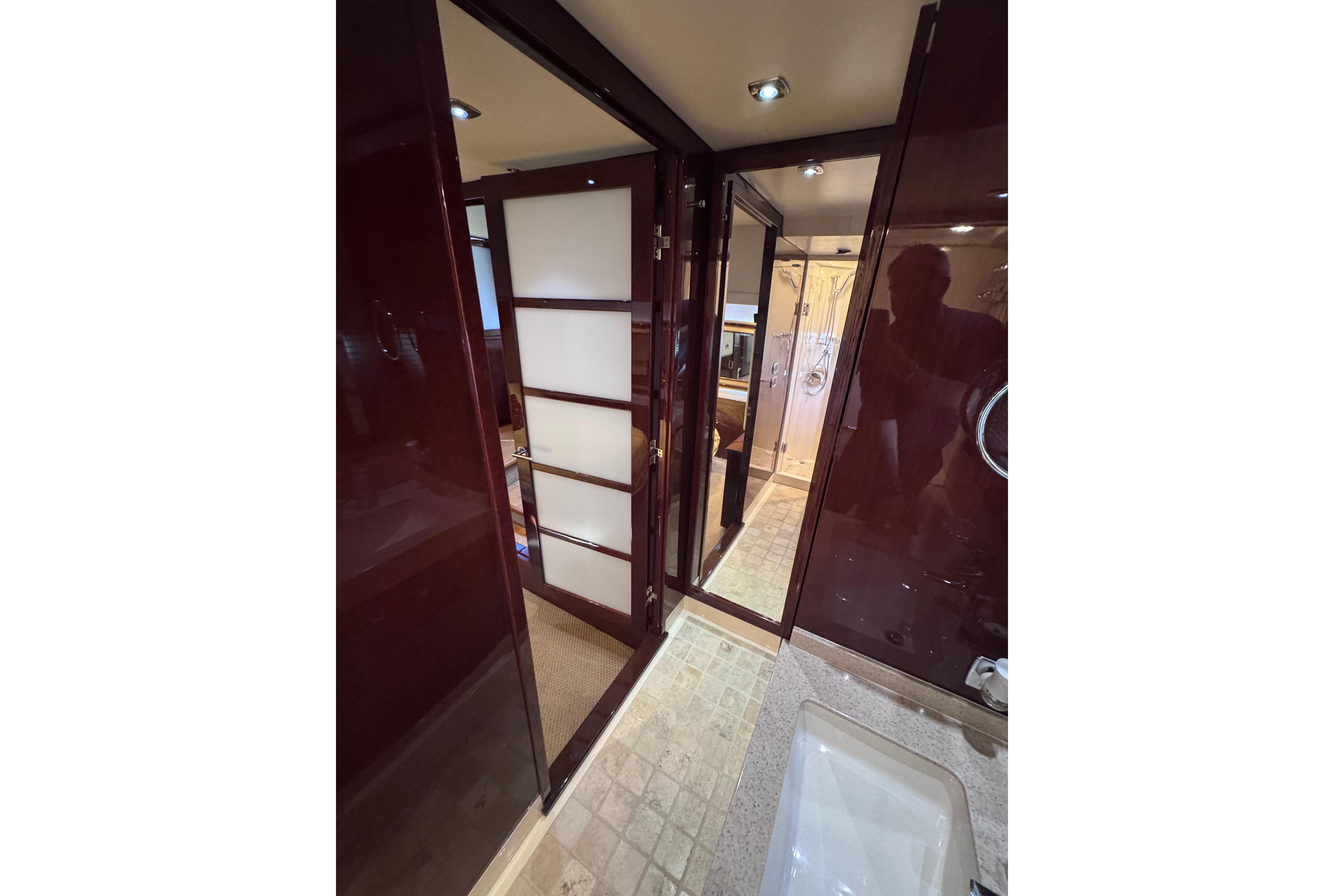 Interior of 2011 Sea Ray 540 Sundancer yacht, featuring elegant wood finishes and modern design.