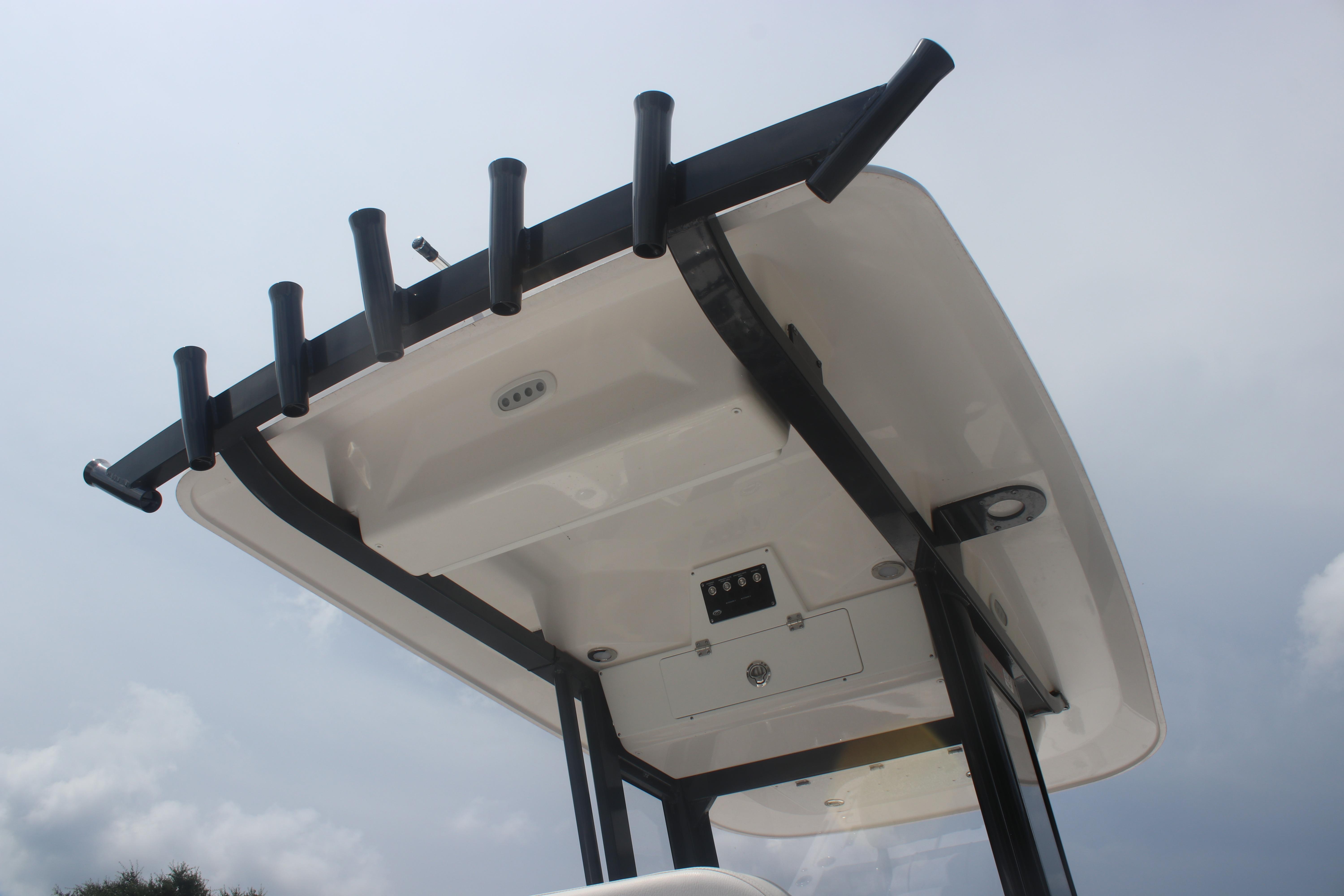 T-top view of 2025 Sea Fox 231 Bay Fox boat against cloudy sky.