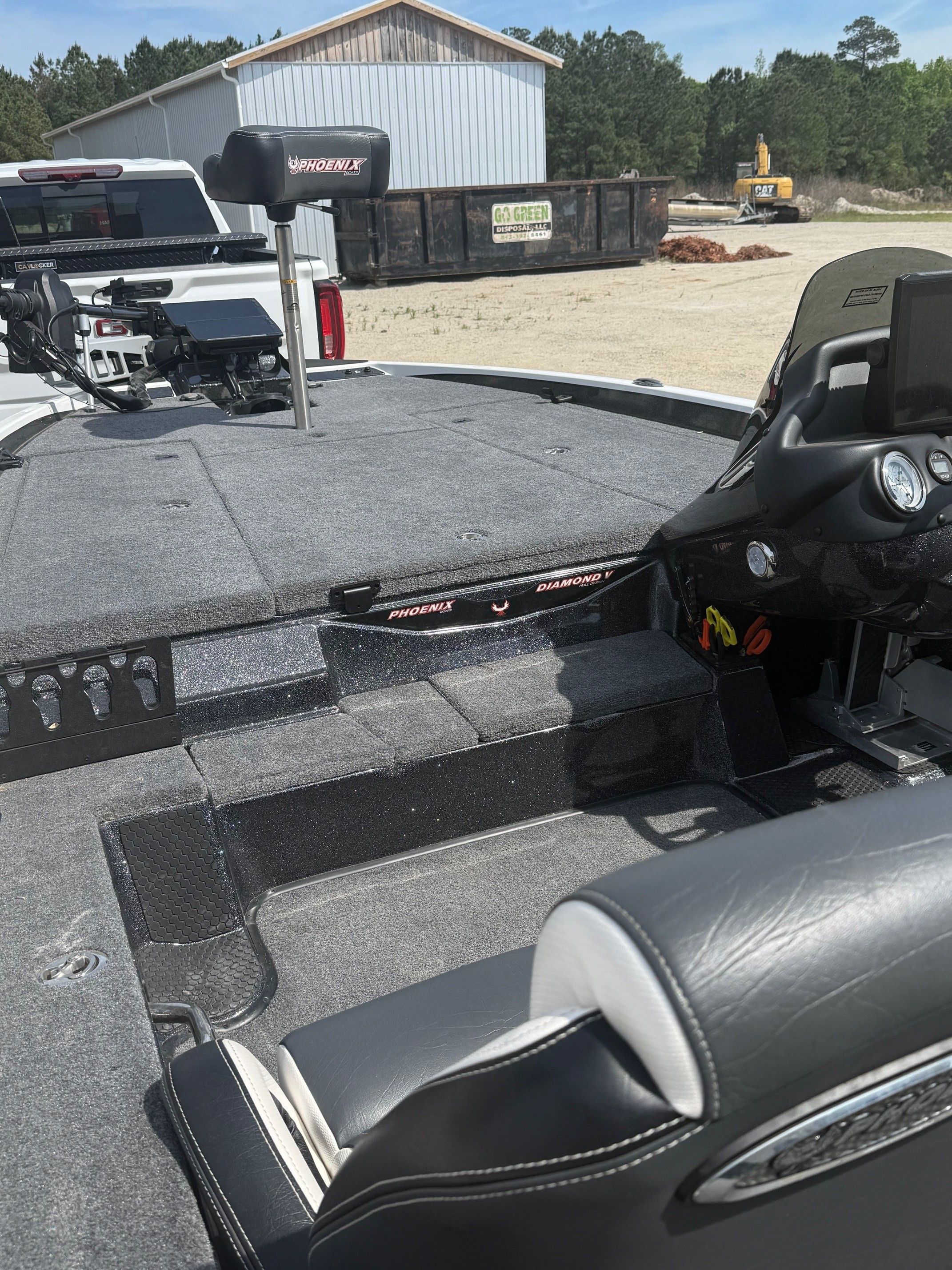 Interior of a 2025 Phoenix 721 ZXL boat on a trailer.