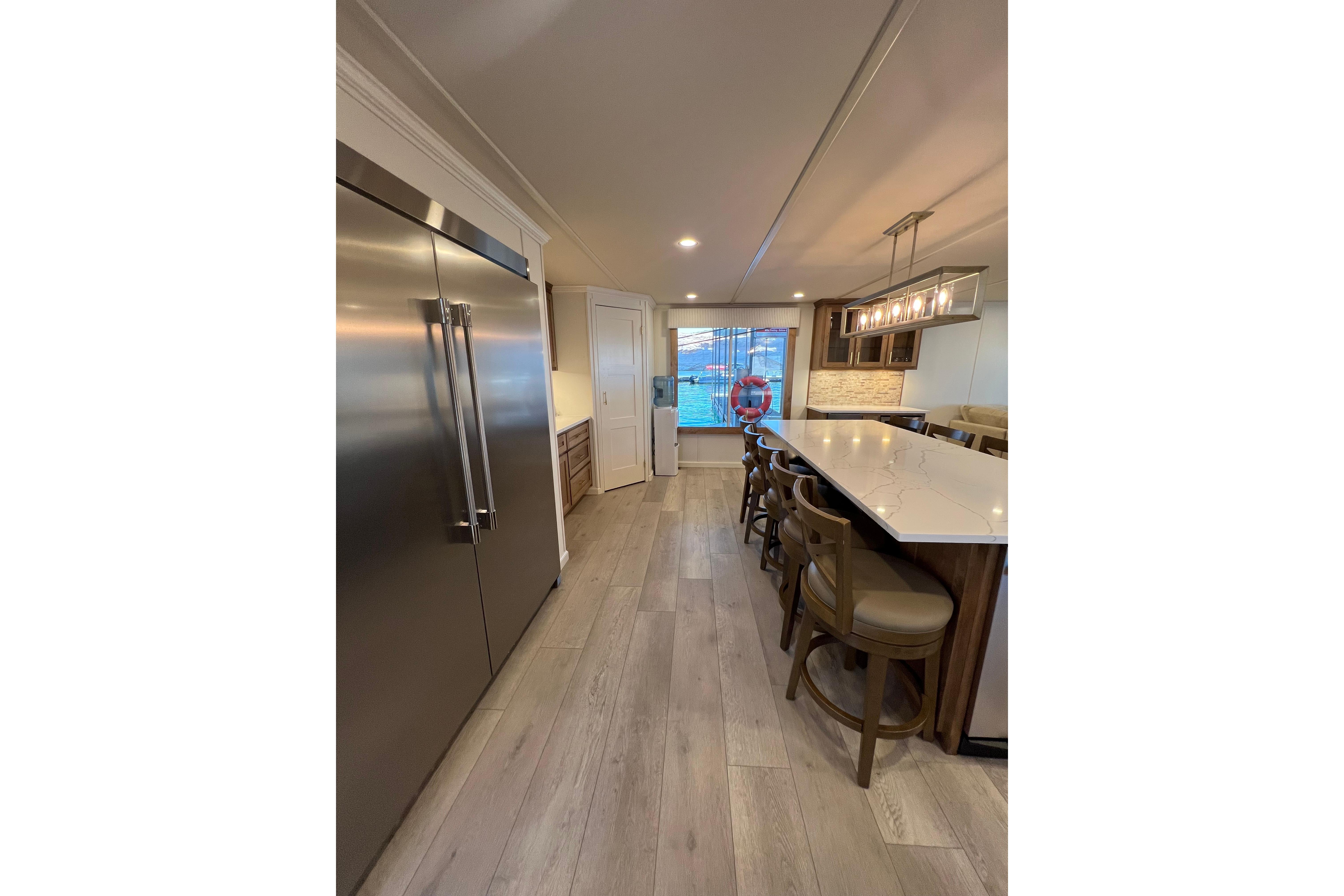 Modern kitchen interior on 2025 Sumerset Excellence Multiple Shares houseboat, featuring sleek design and spacious layout.