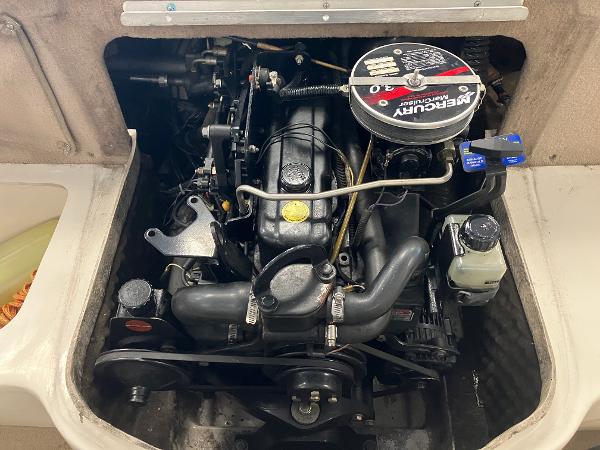 Engine of a 2001 Sea Ray 180 Bow Rider boat, featuring a Mercury 3.0L motor.