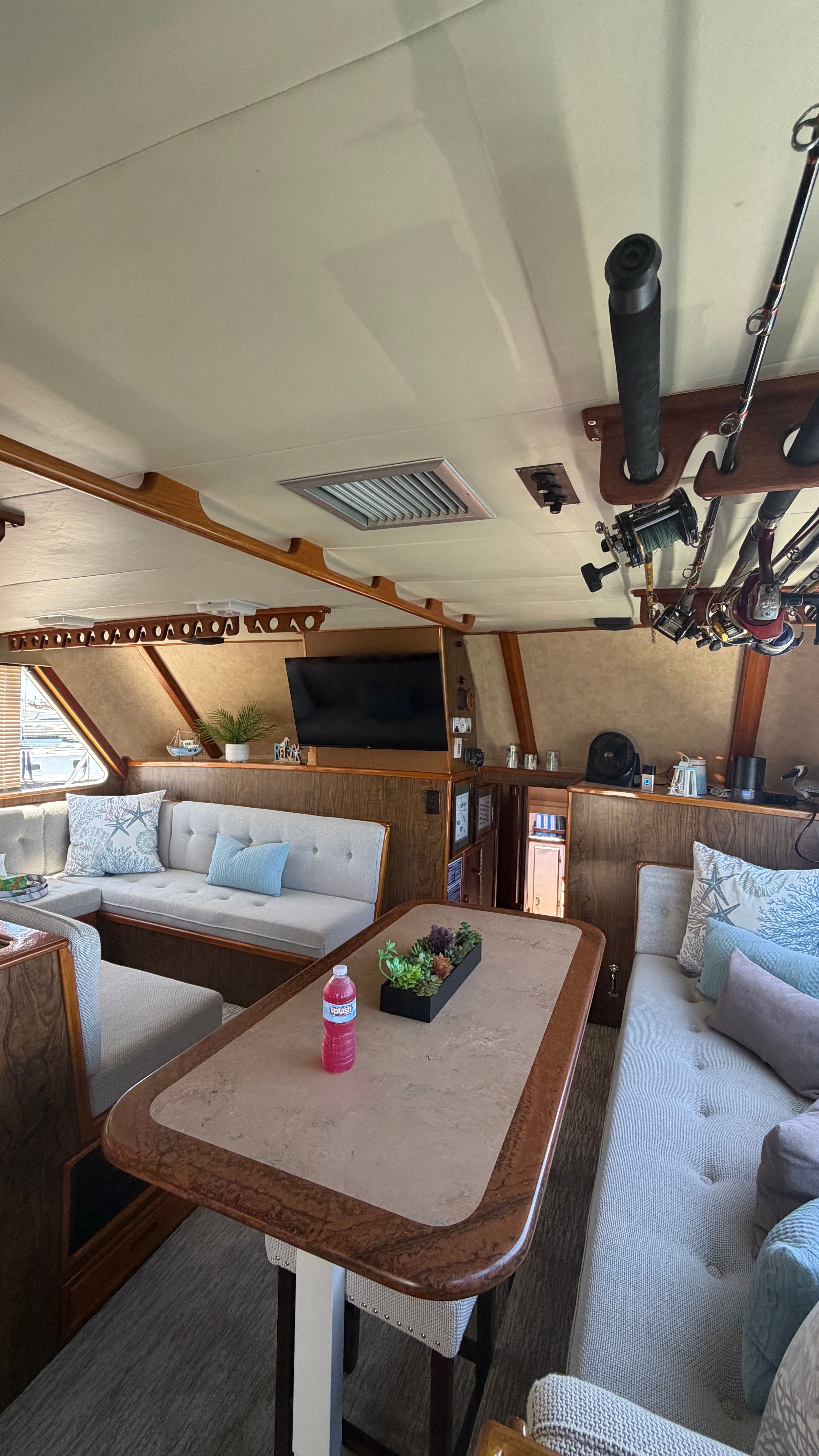 Interior of a 1966 Drake Yachtfisher with cozy seating area.