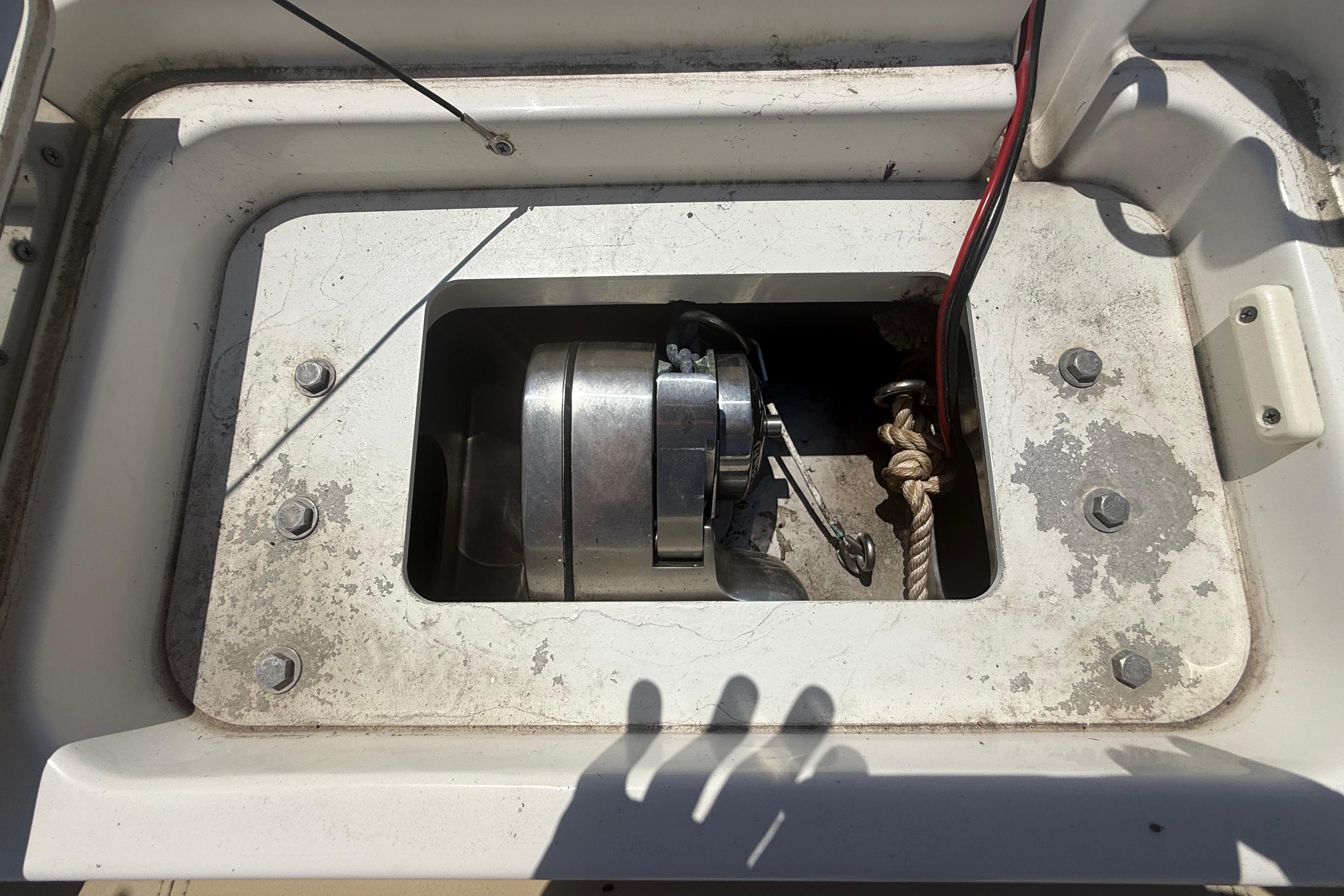 2019 Key West Billistic 281 Center Console anchor compartment with winch and rope.