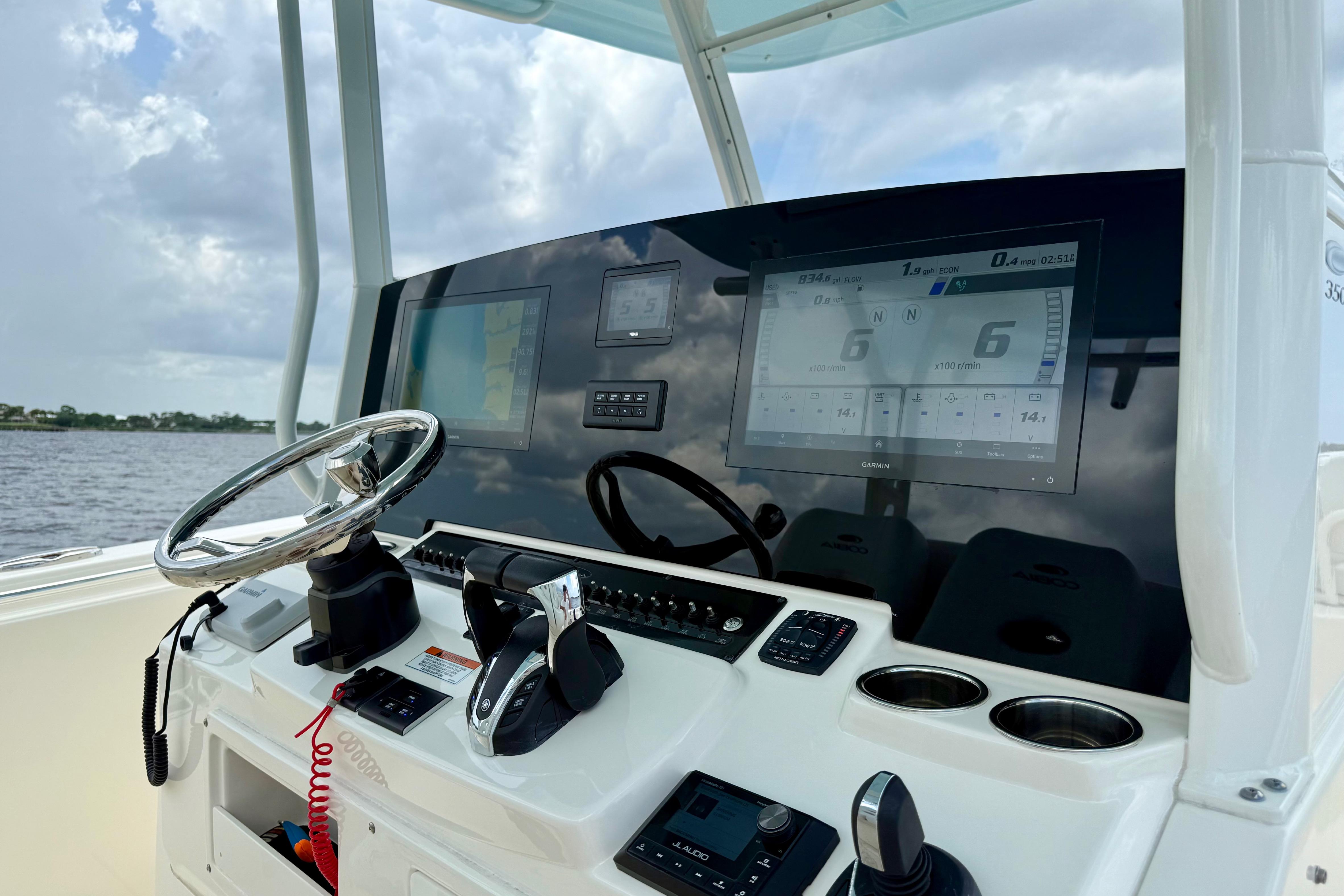 2023 Cobia 350 Center Console helm with advanced navigation displays and controls.