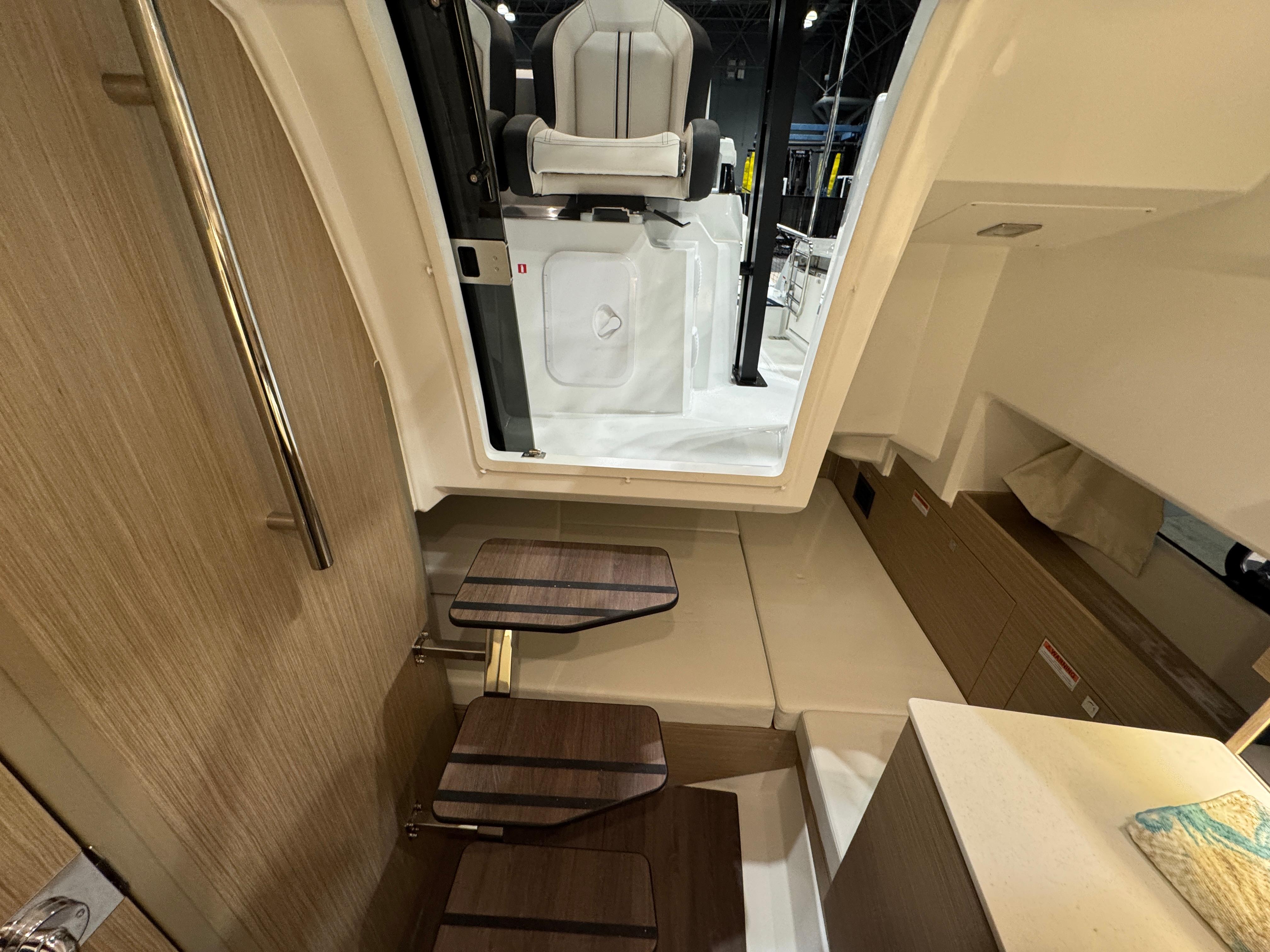 Interior view of 2025 Jeanneau Leader 9.0 WA Series 2 boat cabin.