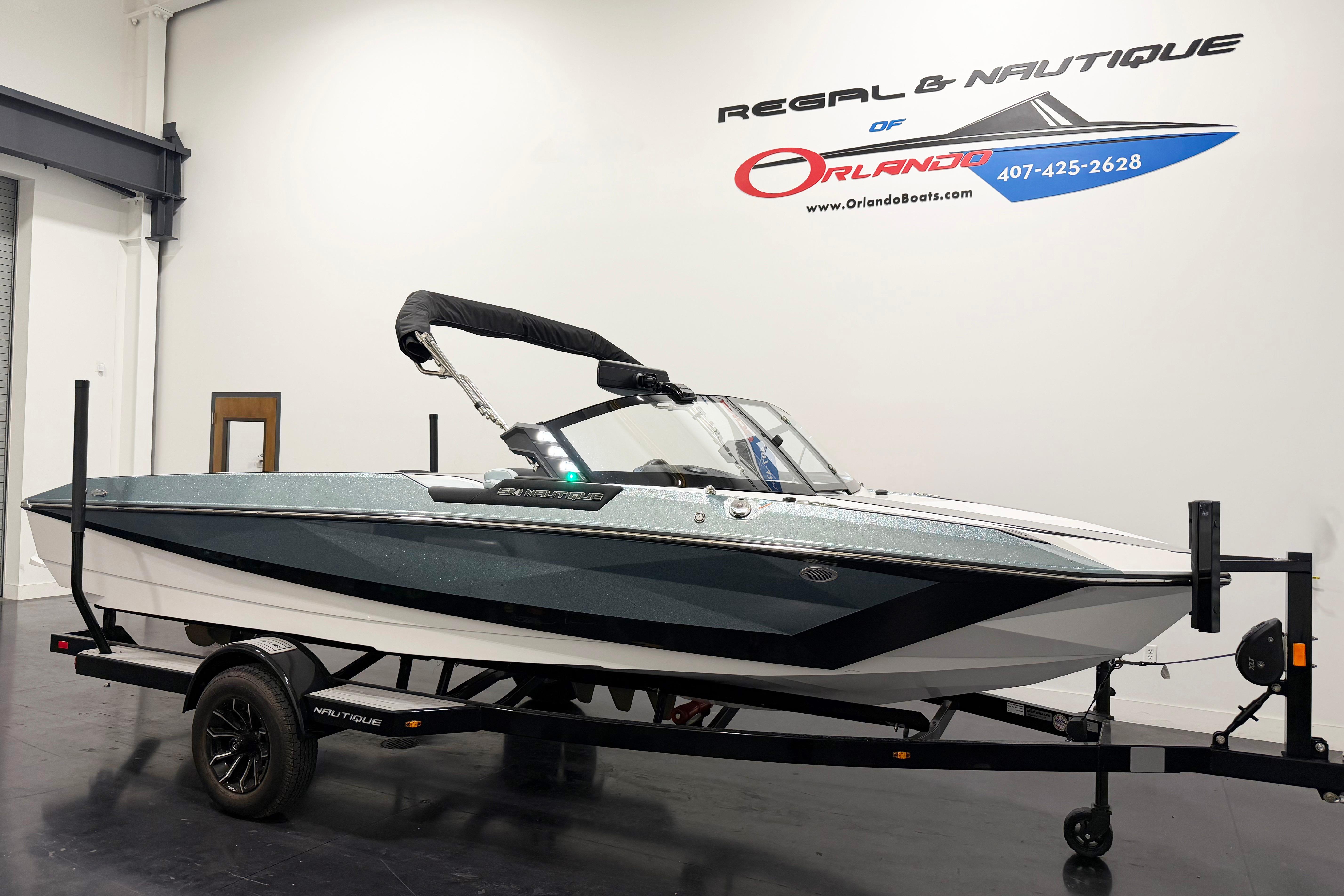 2025 Nautique Ski Nautique boat on trailer at Regal & Nautique of Orlando showroom.