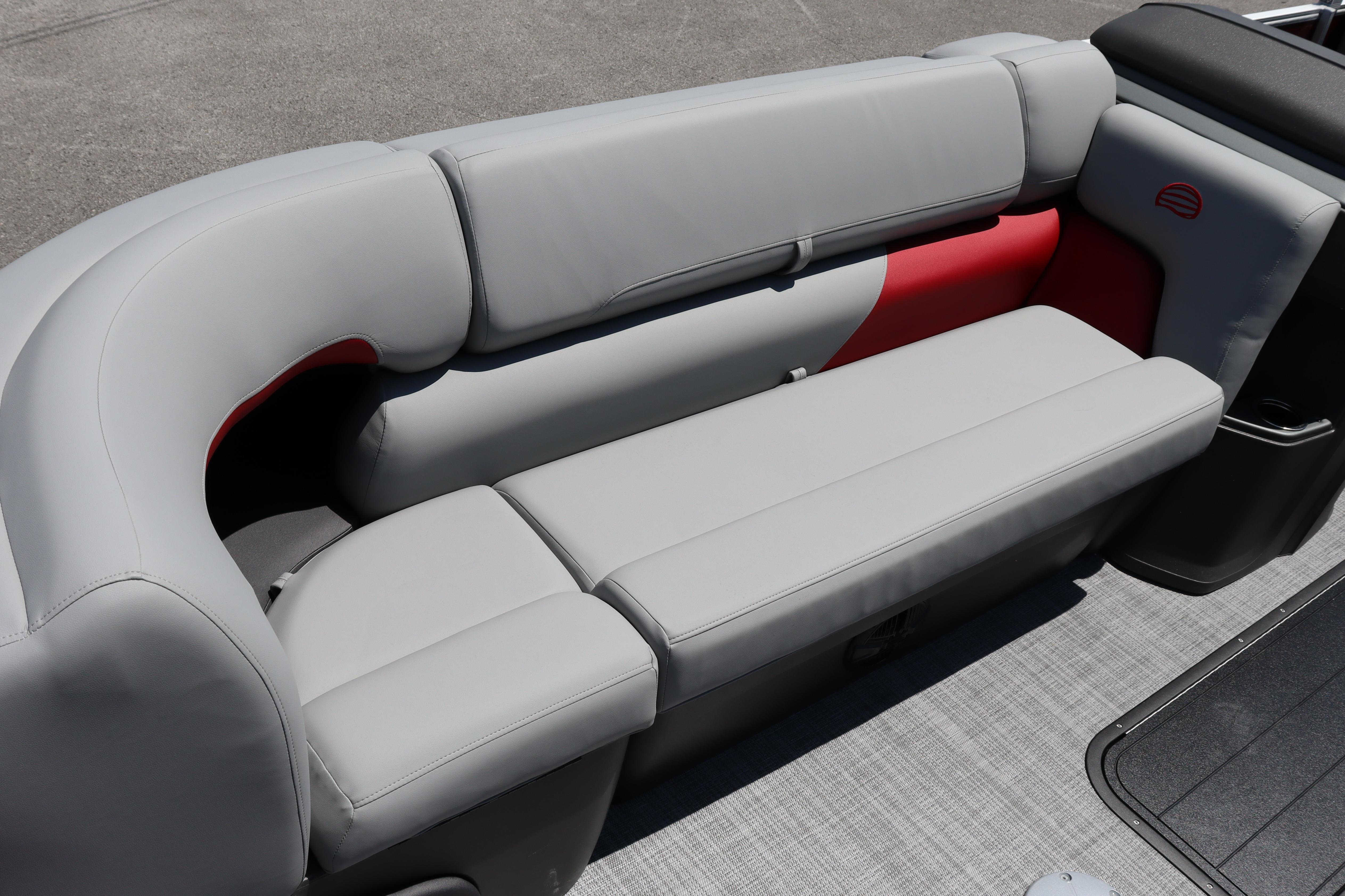 2026 Sun Tracker Party Barge 22 XP3, featuring comfortable gray seating with red accents.
