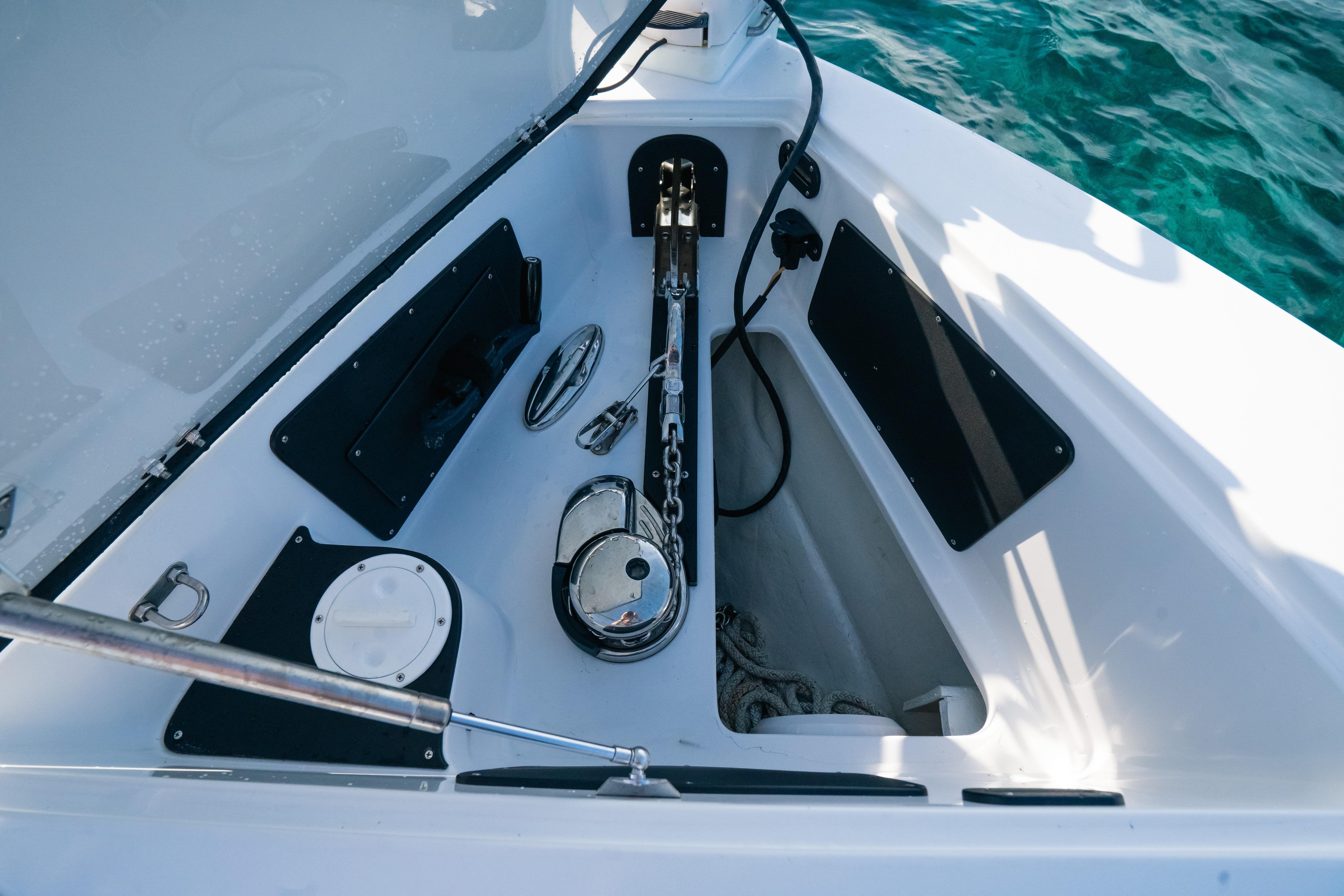 Anchor compartment of 2022 Nor-Tech 392 Super Fish boat with visible chain and equipment.