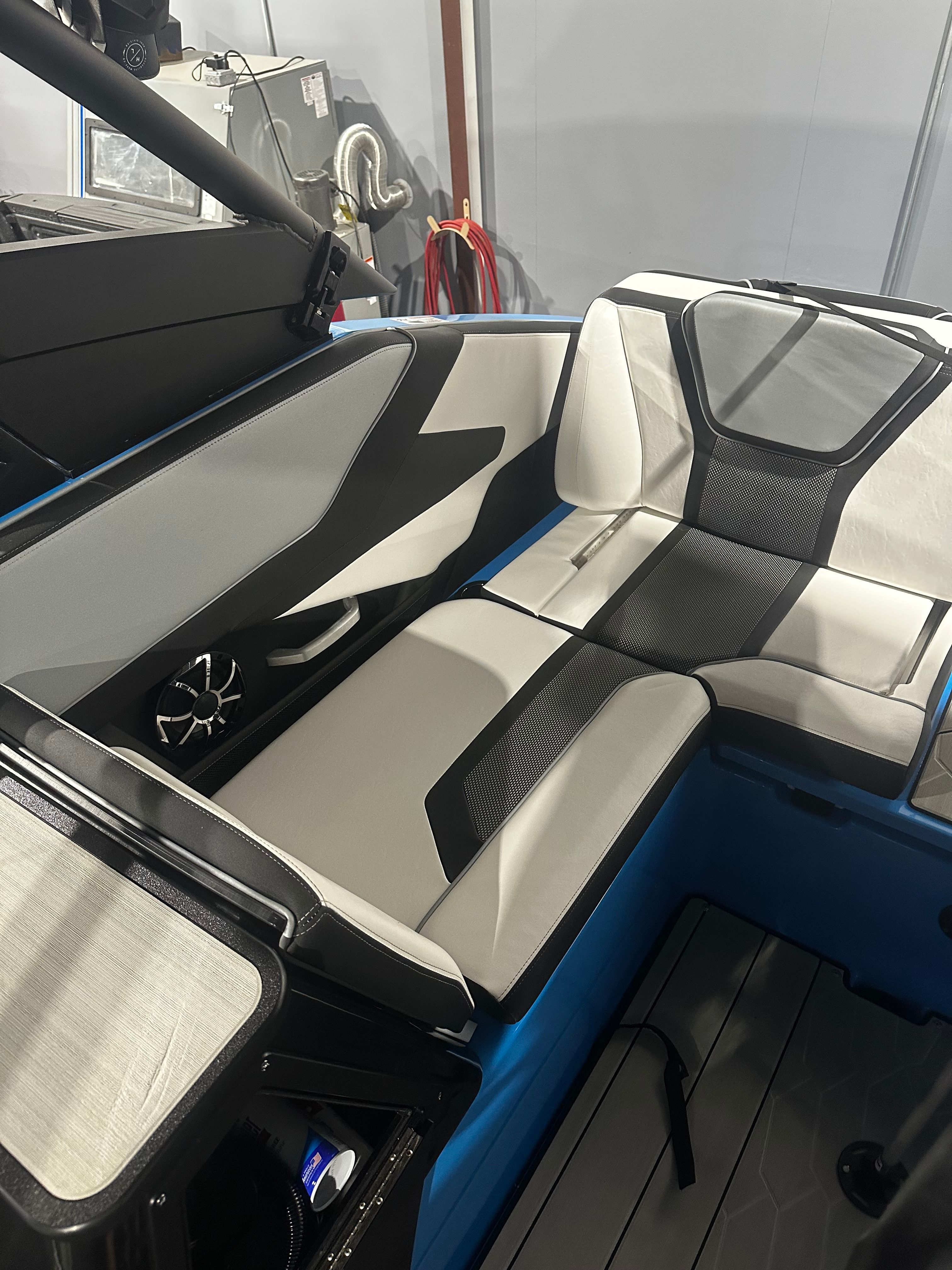 2023 Yamaha Boats 255XD interior with sleek seating and modern design.