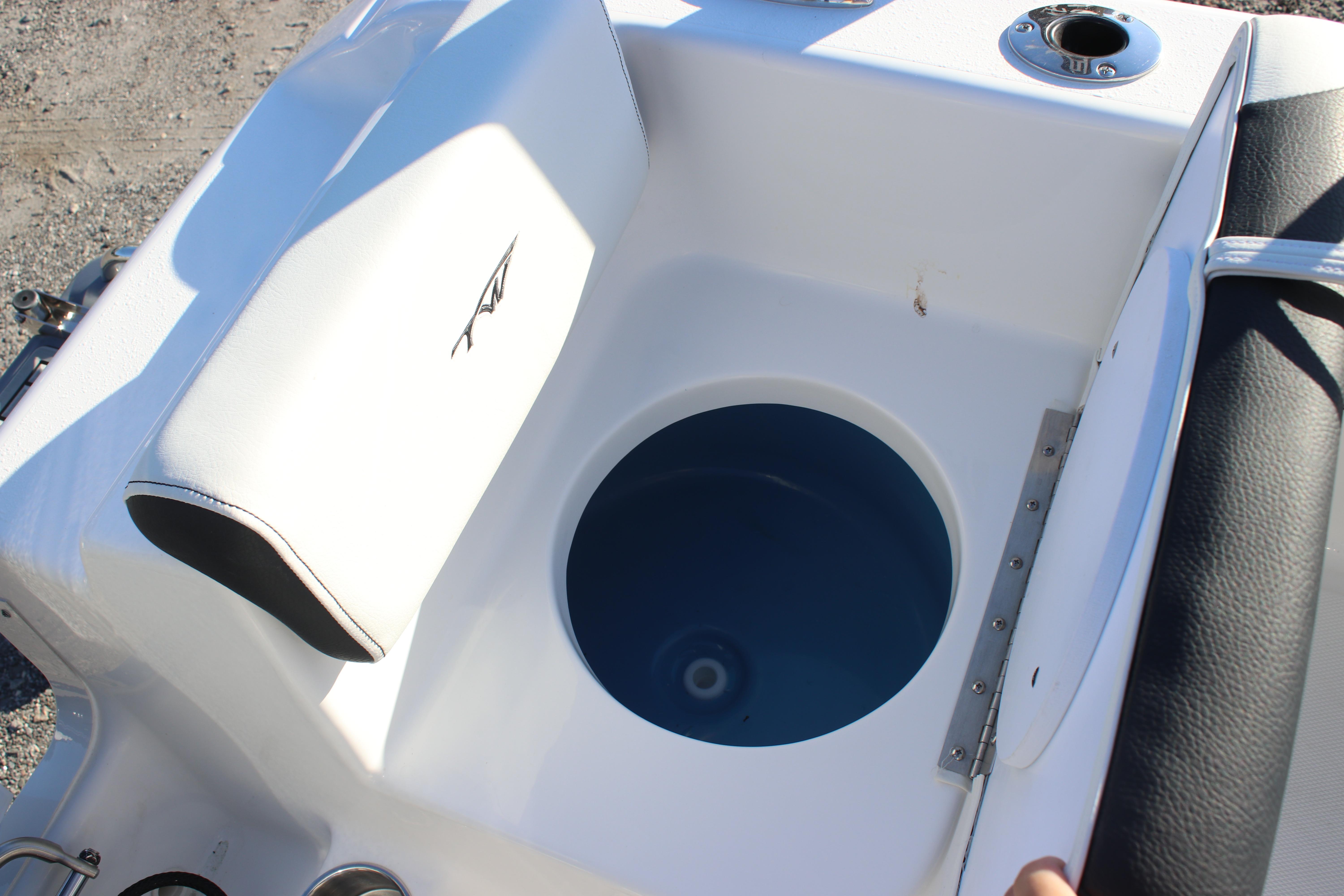 2026 Tidewater 180 CC Adventure boat livewell with cushioned seating.