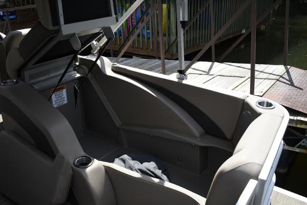 2023 Bennington 22 SXCW boat interior with seating and cup holders.