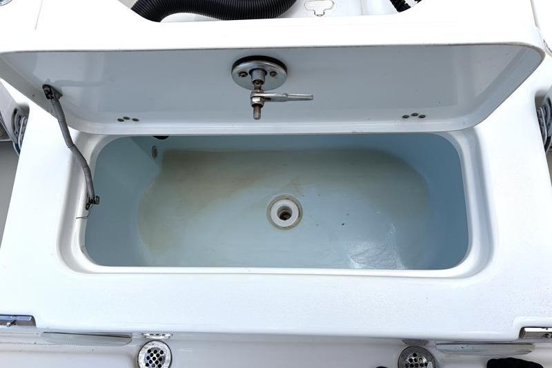Open storage compartment on 2025 Key West 210 Bay Reef boat.