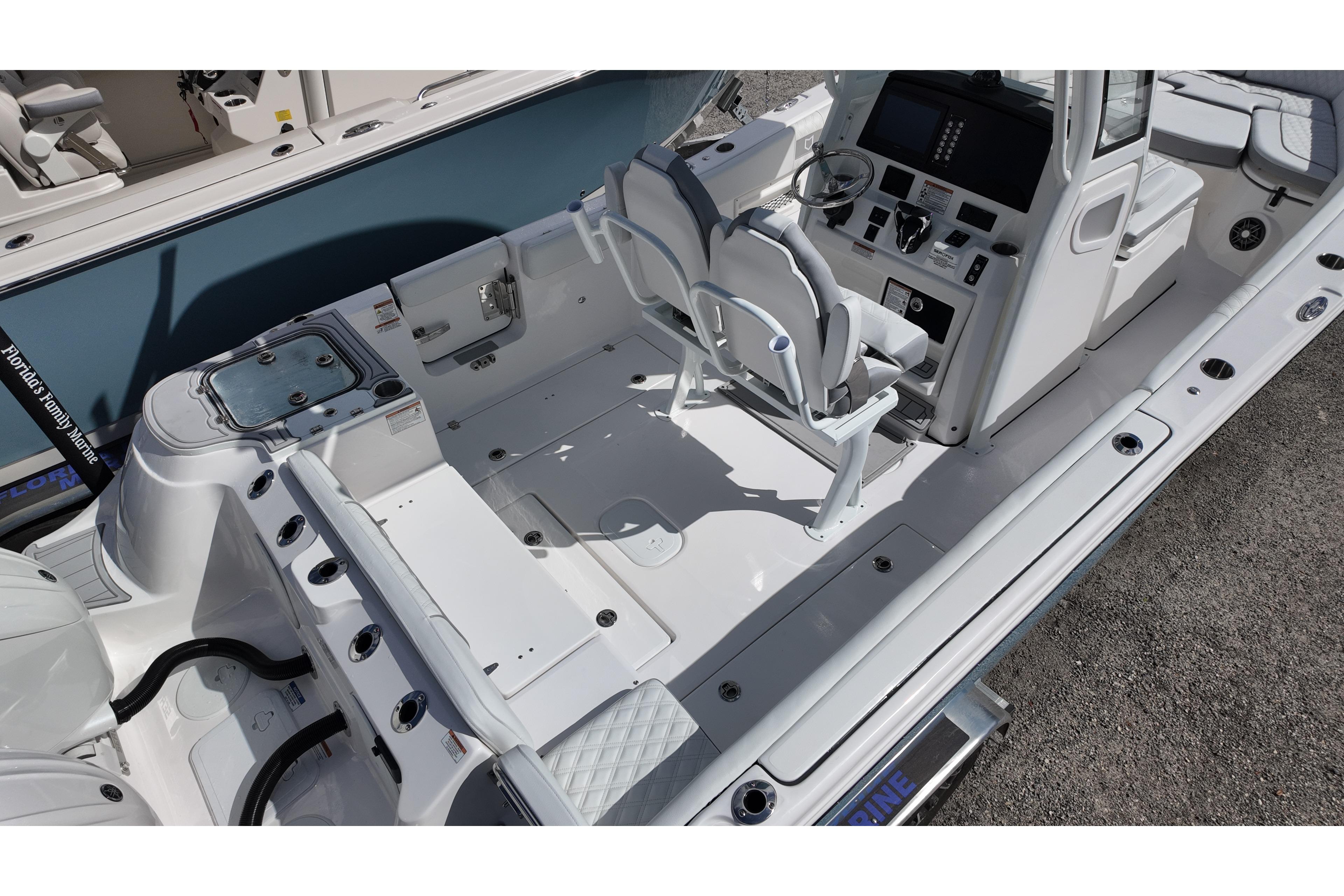 2026 Sea Fox 268 Commander boat interior with dual helm seats and modern dashboard.