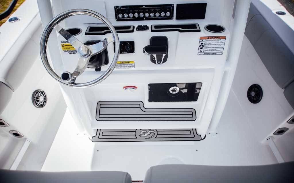 2021 Sea Fox 248 Commander boat console with steering wheel and controls.