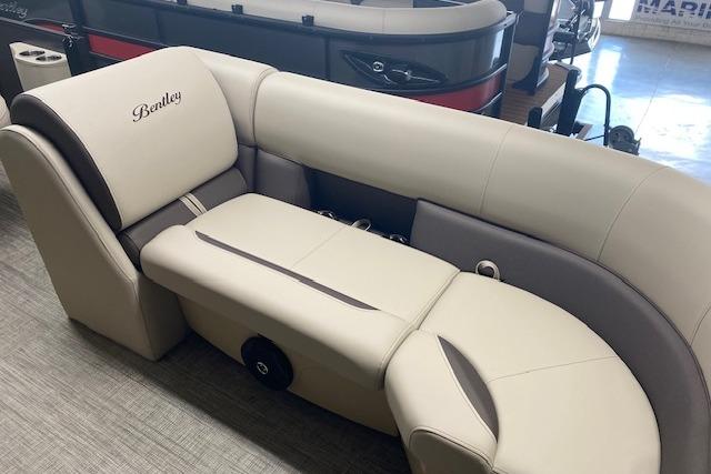 2026 Bentley Pontoons Legacy 223 Navigator interior with luxurious beige seating.