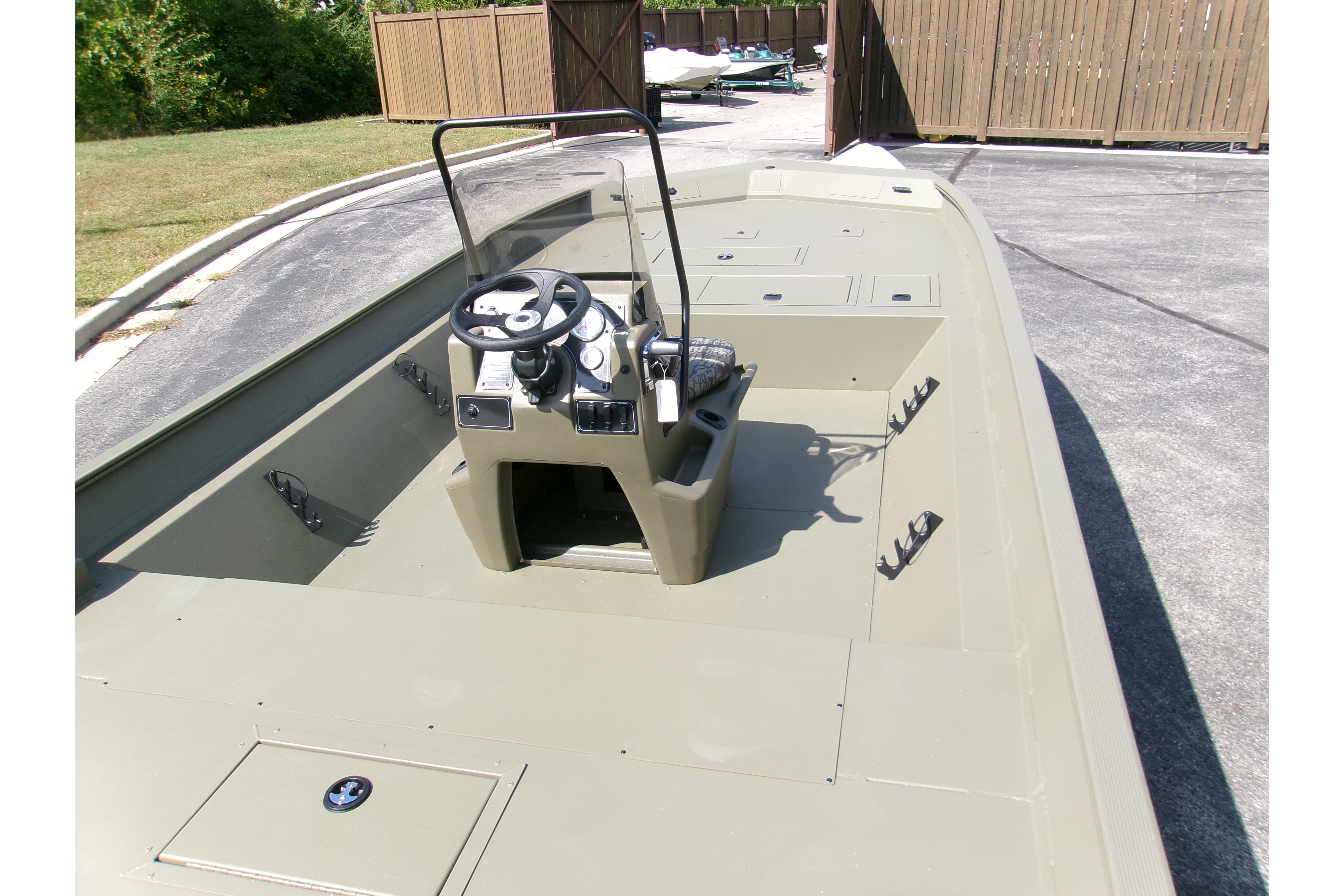 2026 Tracker Grizzly 2072 CC boat with center console and spacious deck.