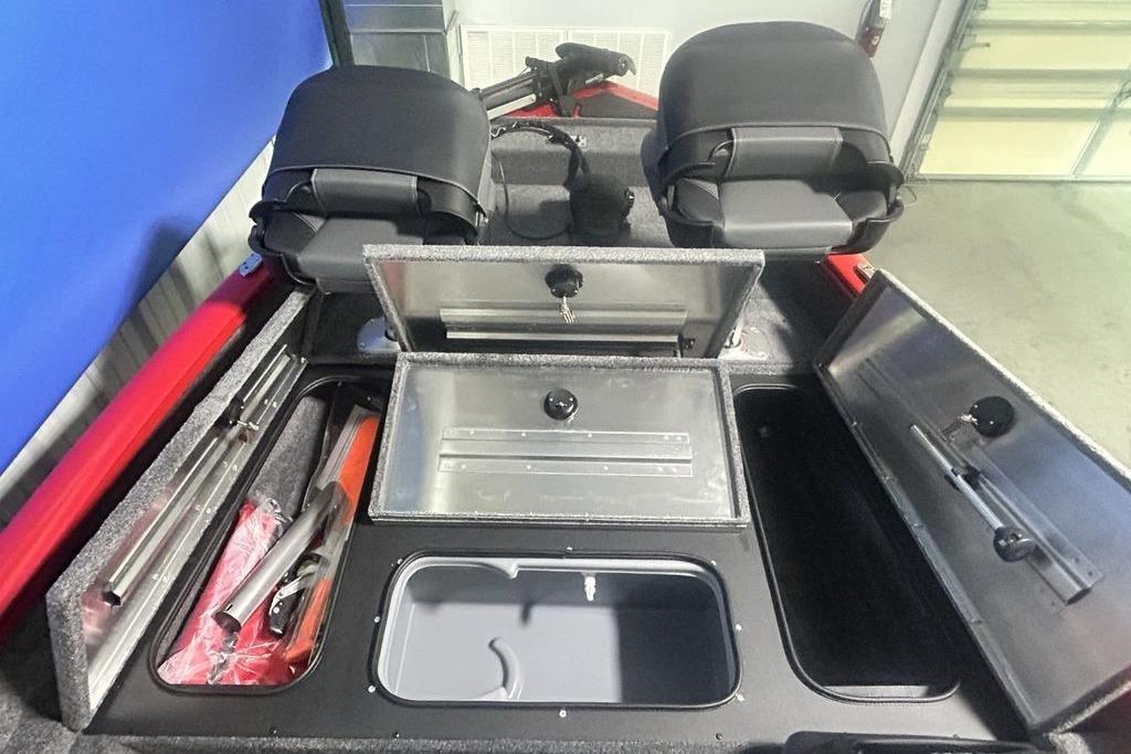 2026 Tracker Pro Team 175 Crappie Edition boat interior with storage compartments open.