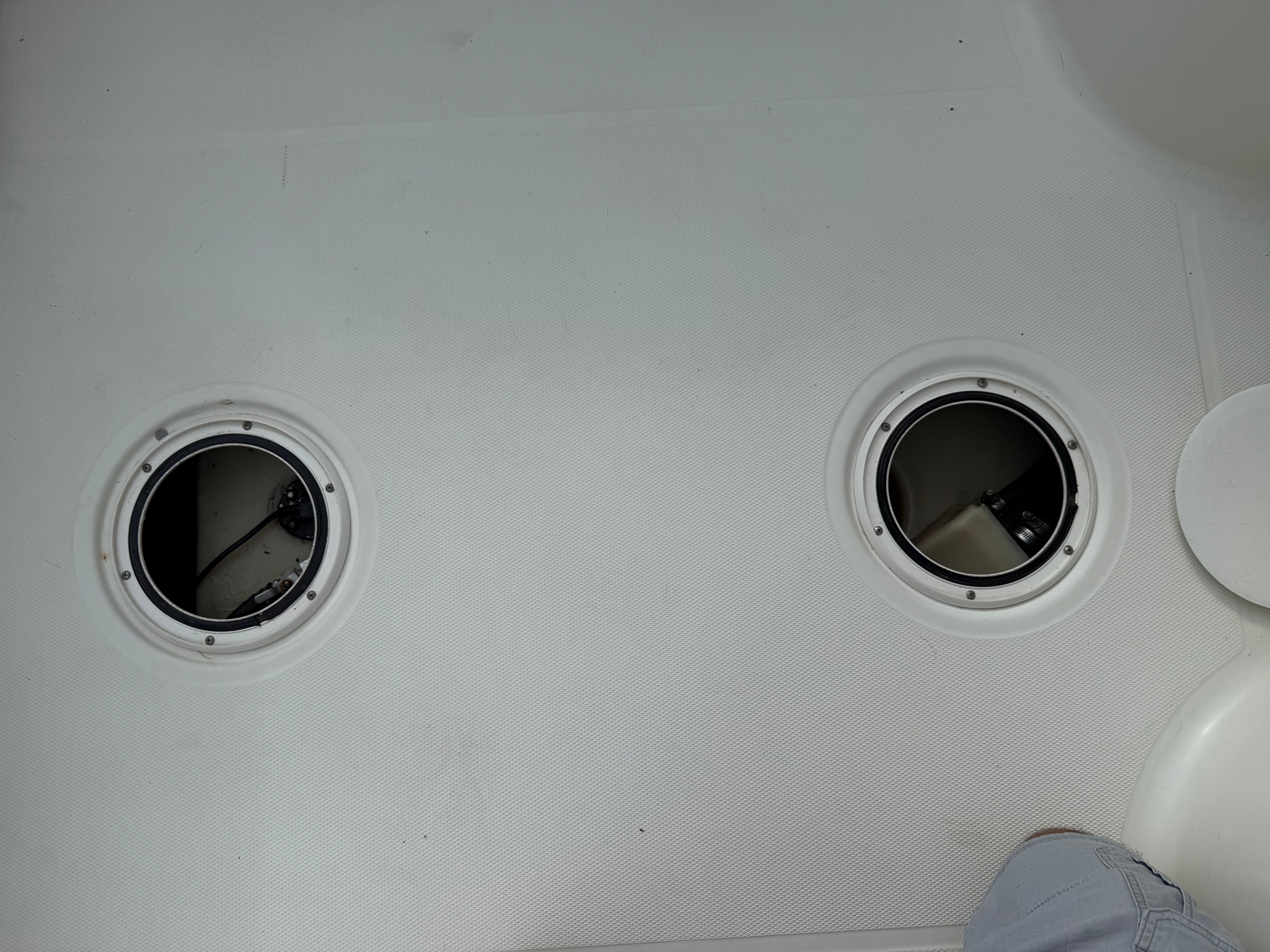 2008 Hydra-Sports Vector 2200 VX boat deck with two circular openings.