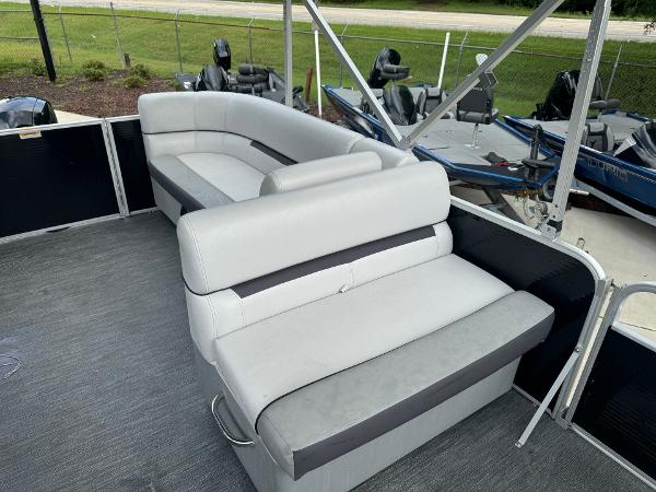 2023 Godfrey 2286 boat interior with gray seating and deck.