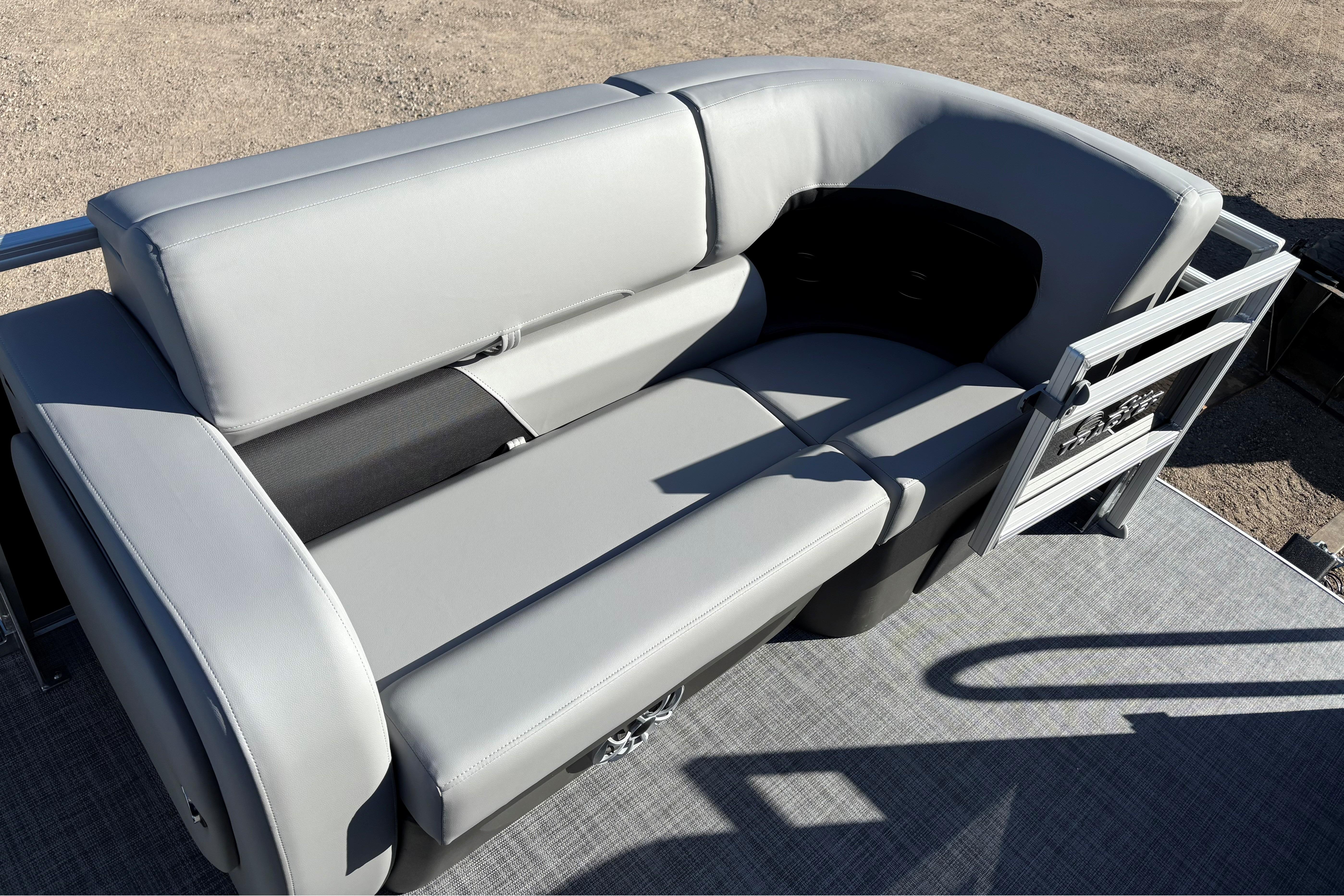 2026 Sun Tracker SportFish 22 XP3 boat seating with gray upholstery and spacious layout.
