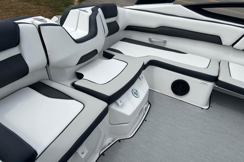2026 Yamaha Boats AR195 interior seating with sleek black and white design.