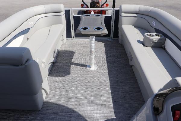 2024 Bennington 21 SSR pontoon boat interior with grey seating and table.