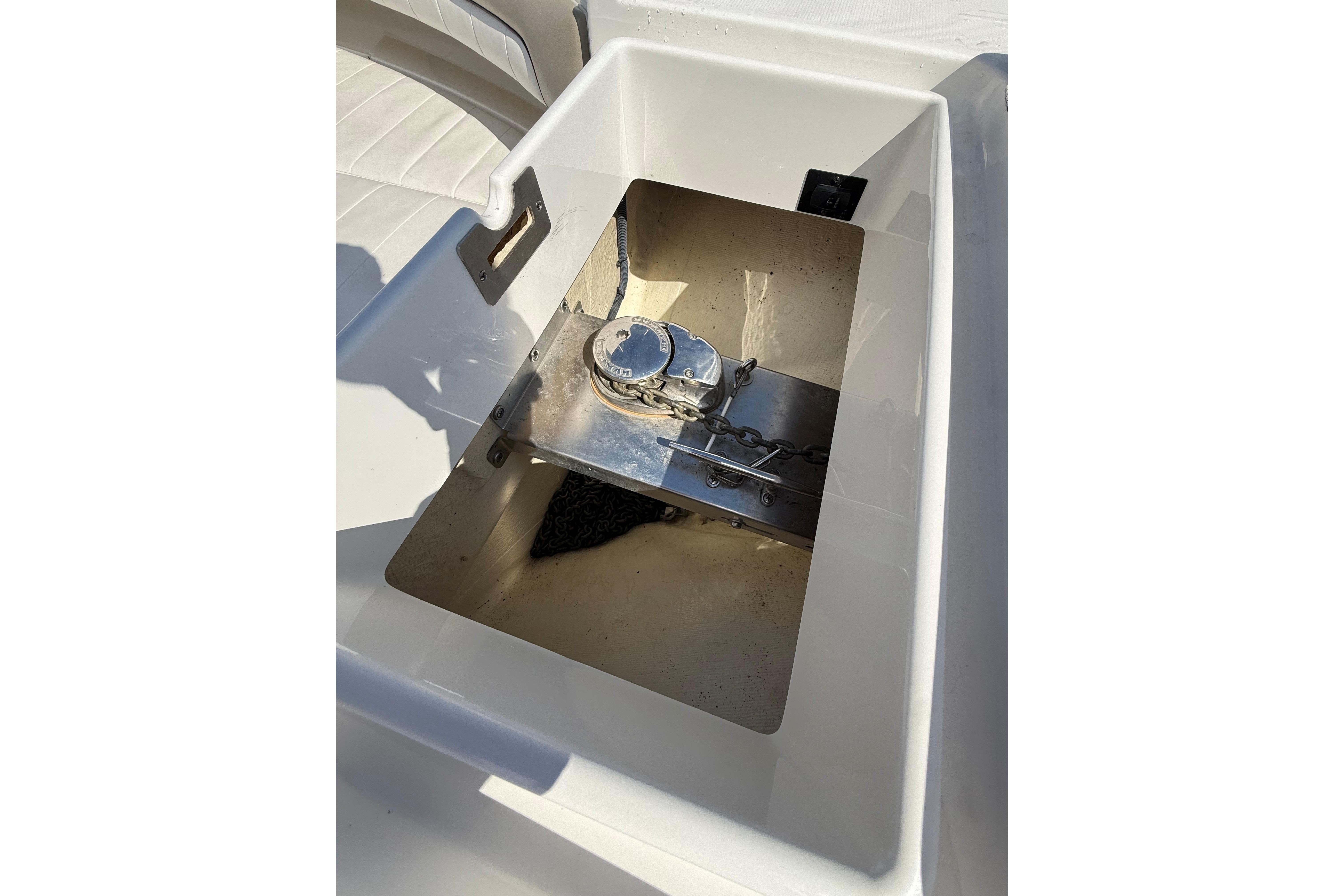 2019 Regulator 34SS anchor locker with chain and winch mechanism.