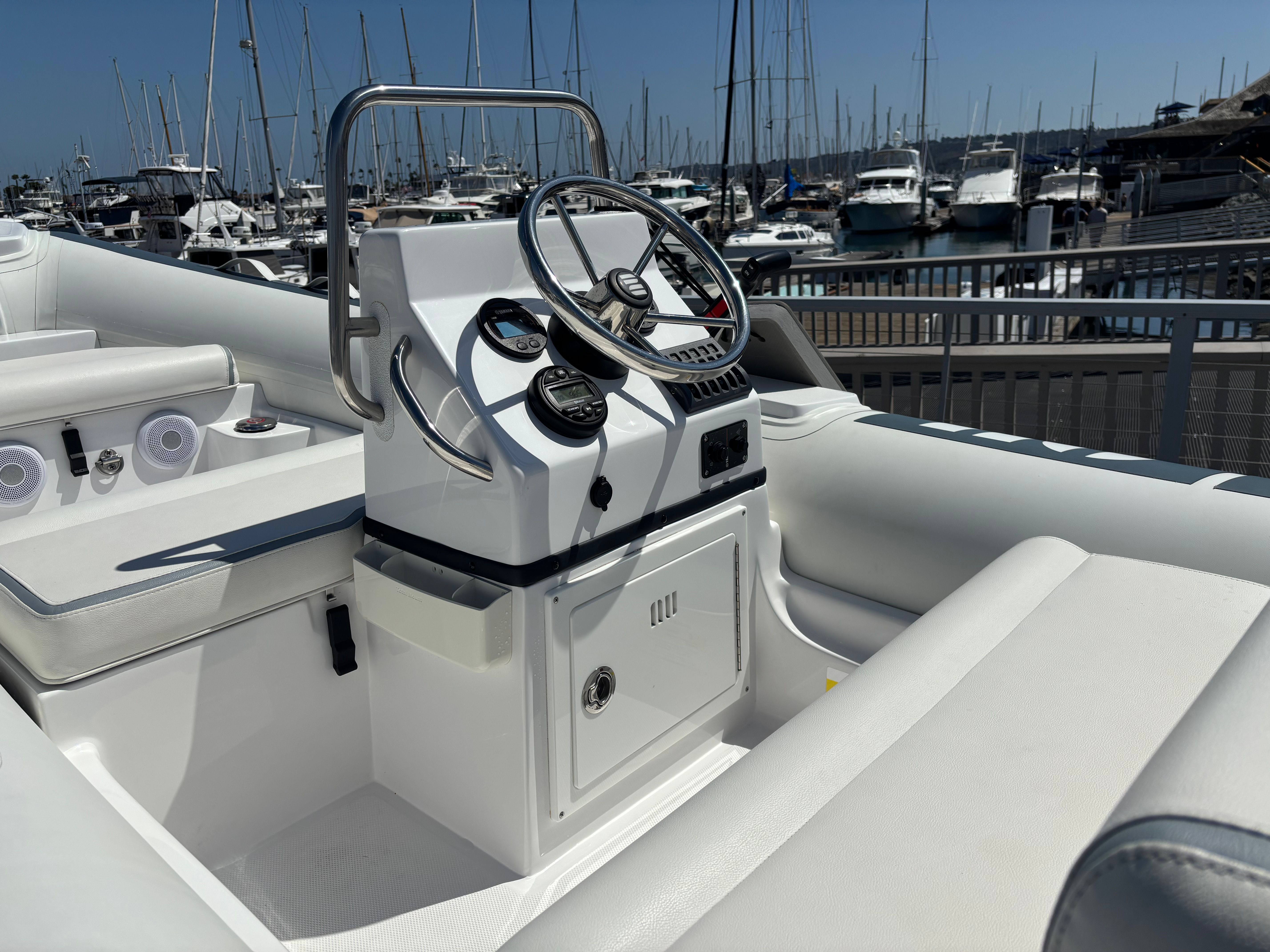 Novurania Deluxe 400 DL 2023 at marina, modern helm station.