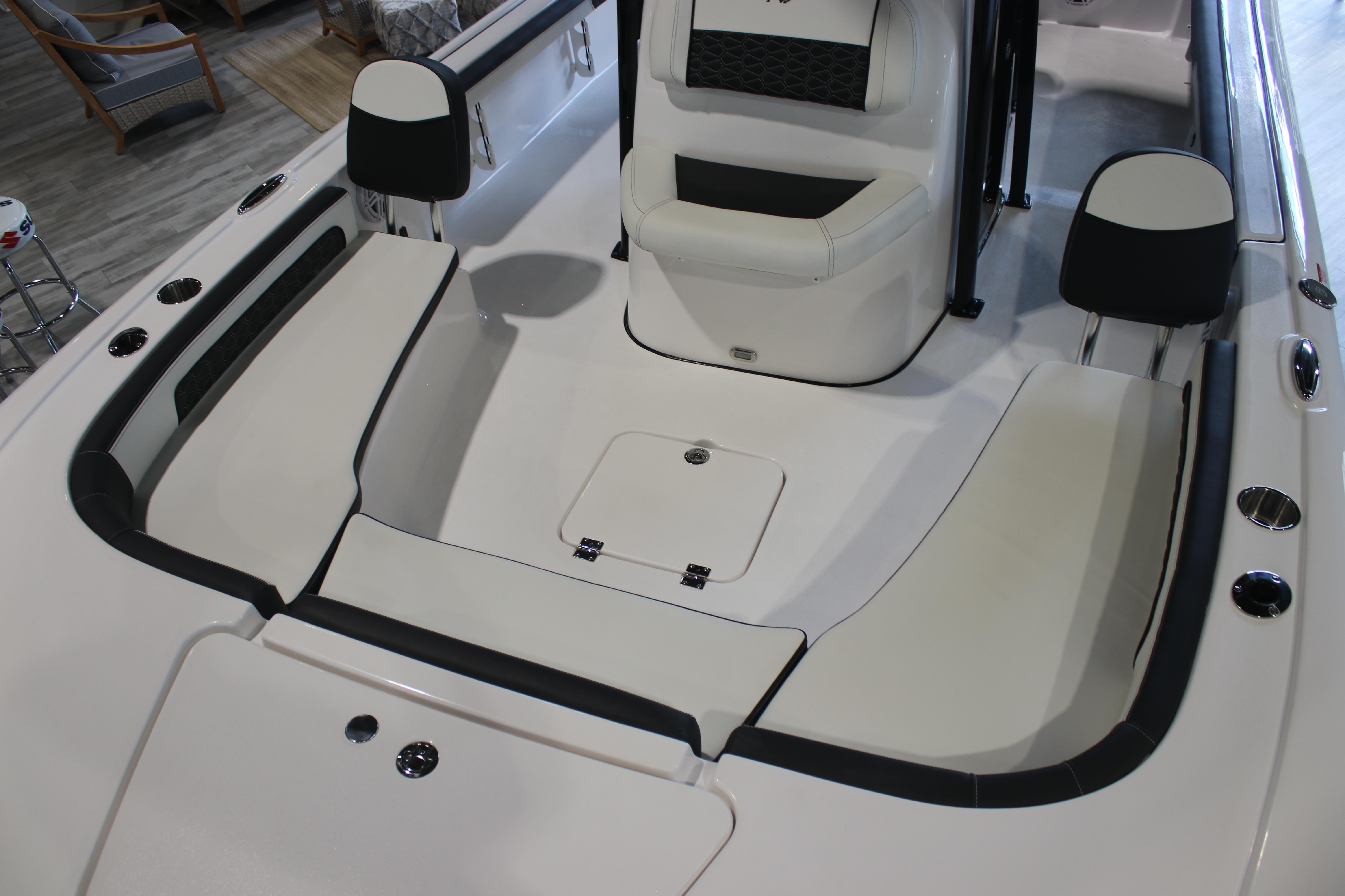 2026 Tidewater 2300 Carolina Bay boat interior with cushioned seating and storage compartments.
