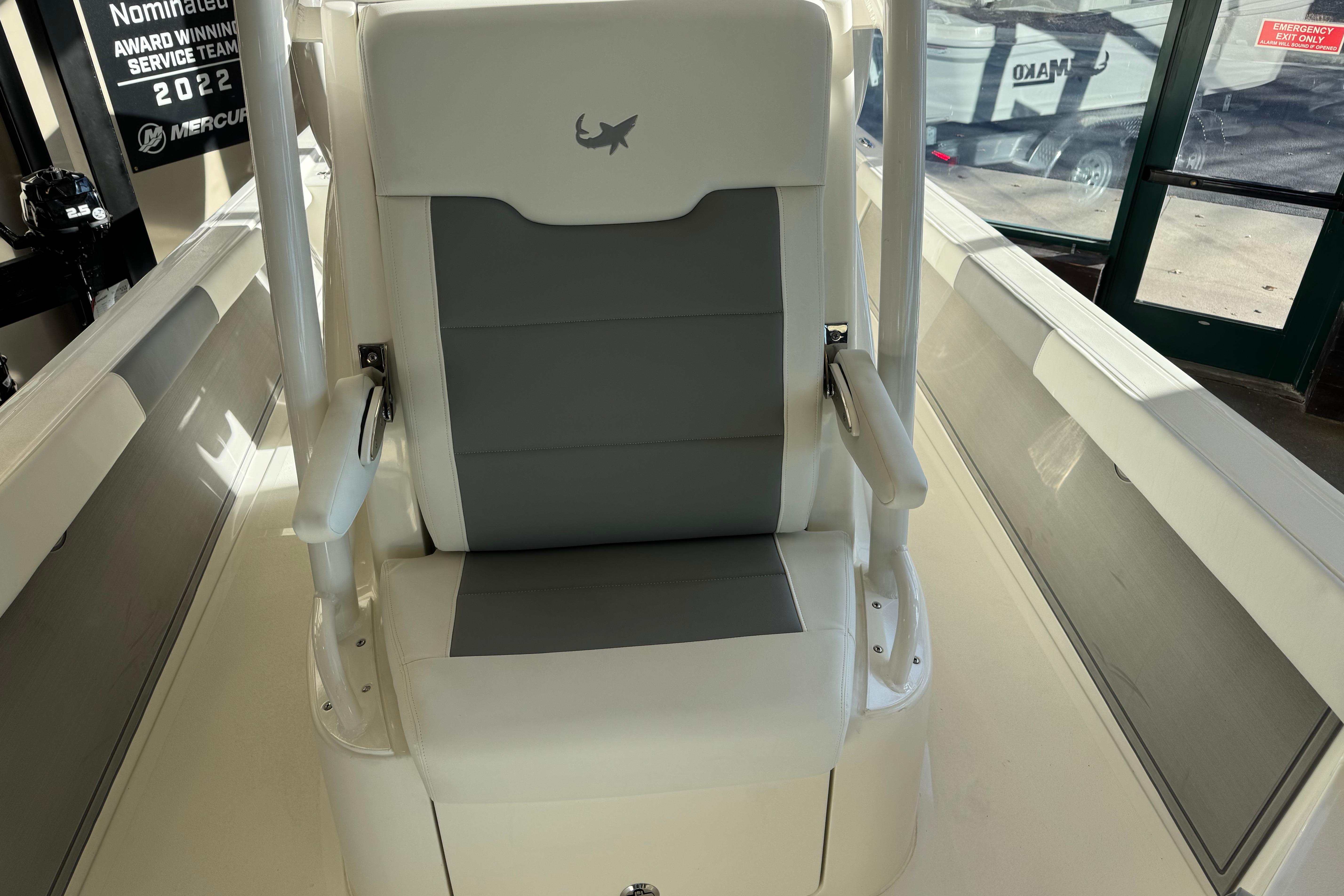 Captain's chair on 2026 Mako 24 APEX boat, featuring sleek design and comfortable seating.