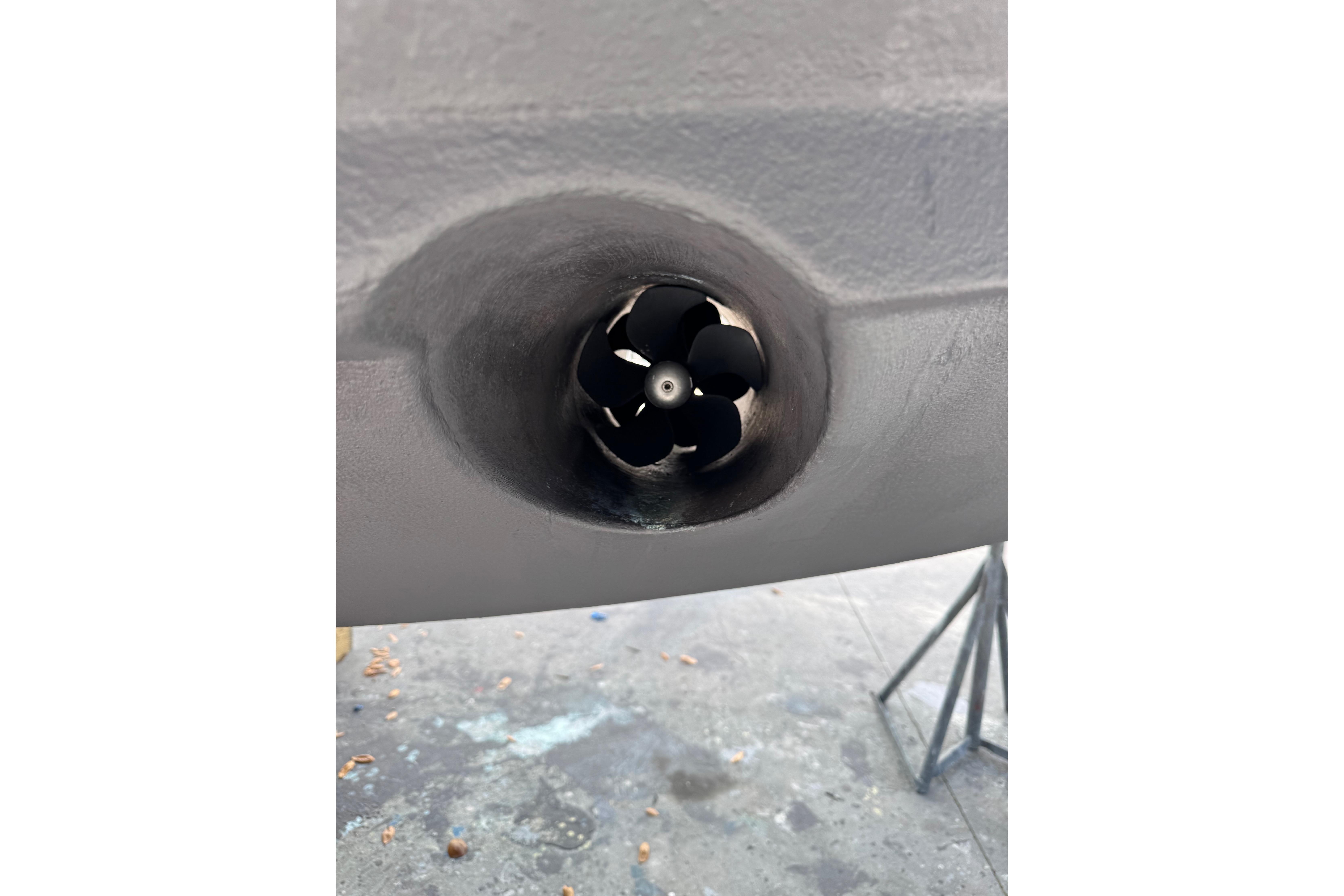 Close-up of a 2013 Cabo 44 Hardtop Express boat's bow thruster.