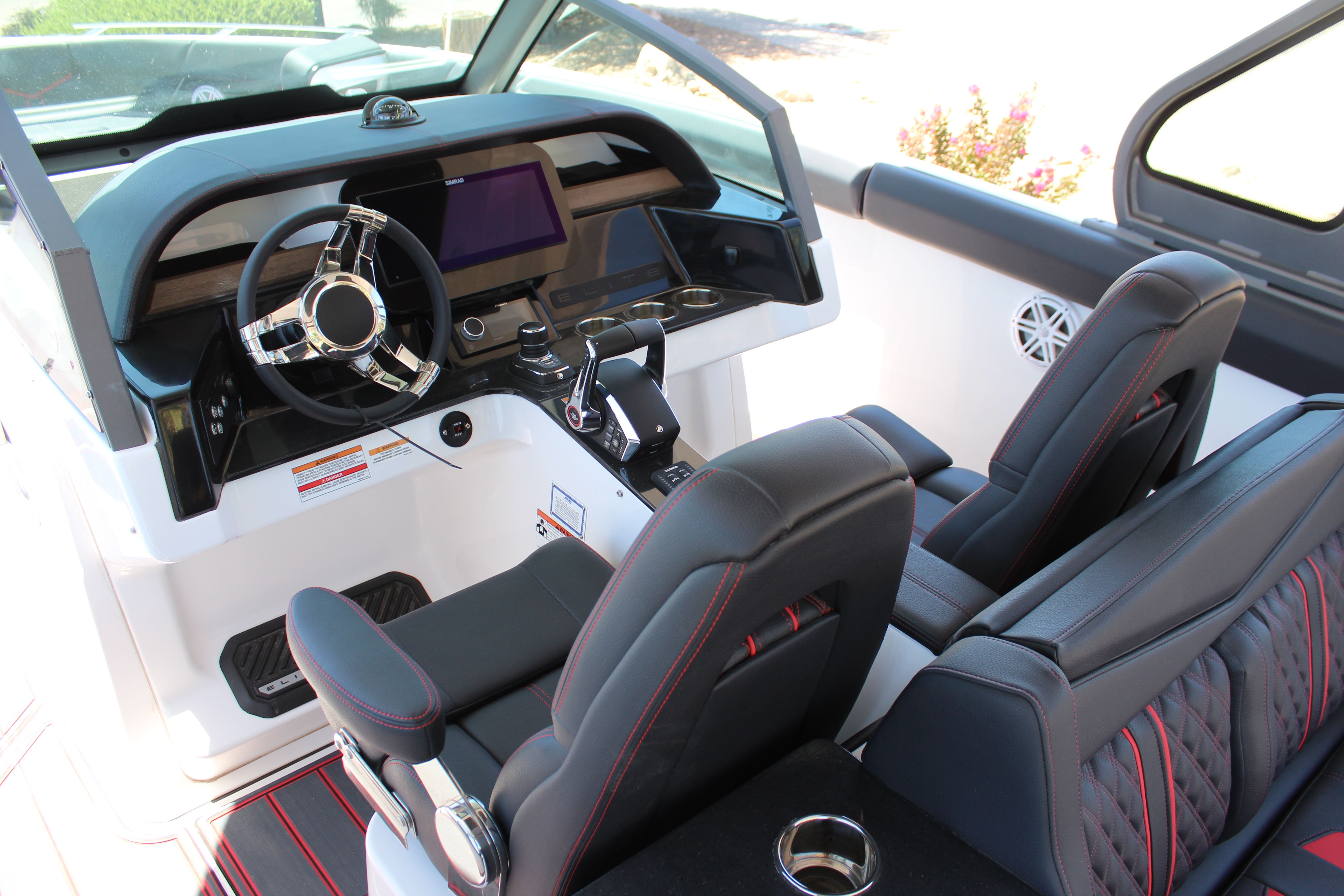 Interior of 2025 Monterey Elite 30 OB with modern cockpit design.