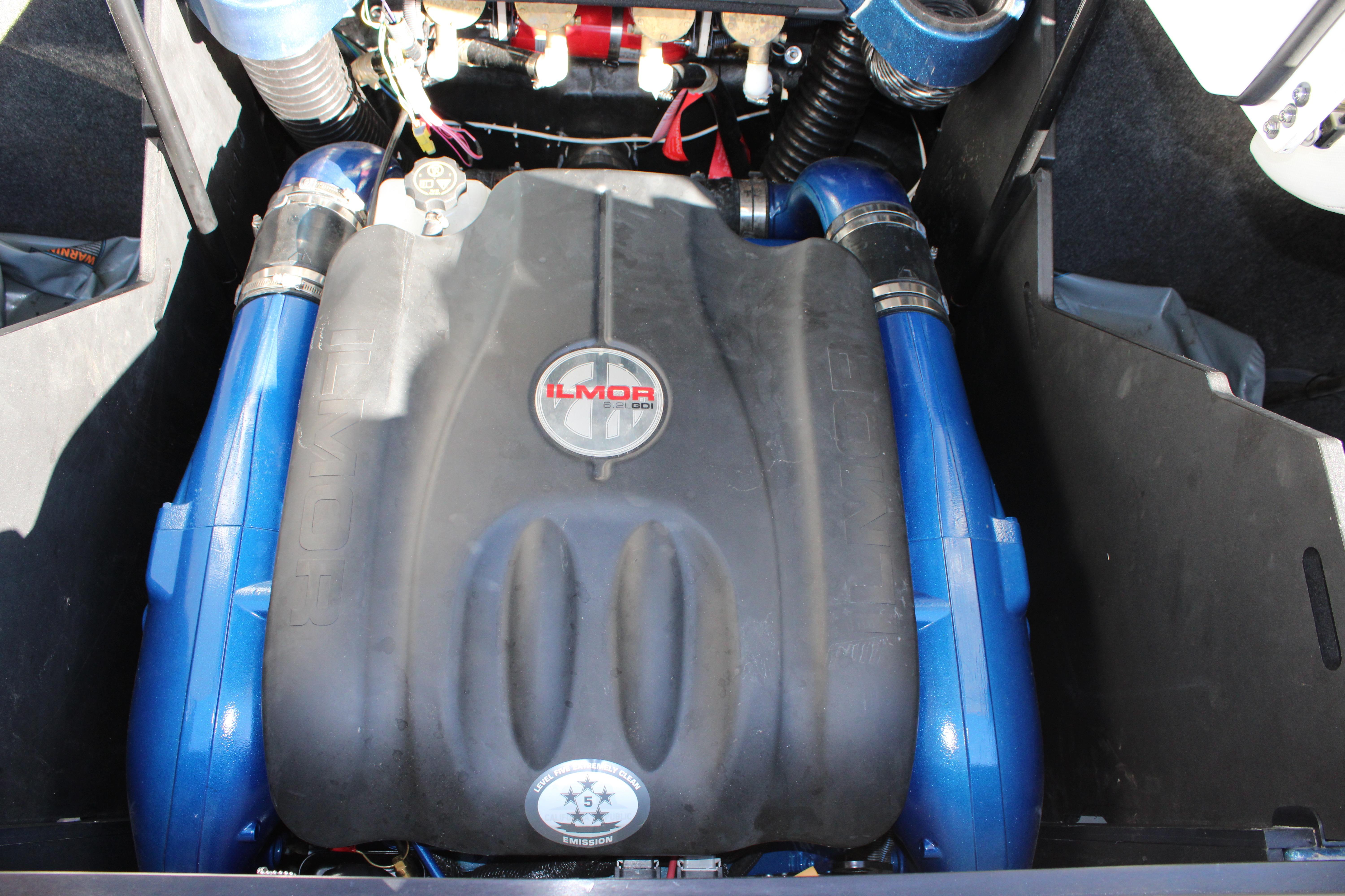 2022 MasterCraft X24 engine compartment with Ilmor engine, featuring blue components.
