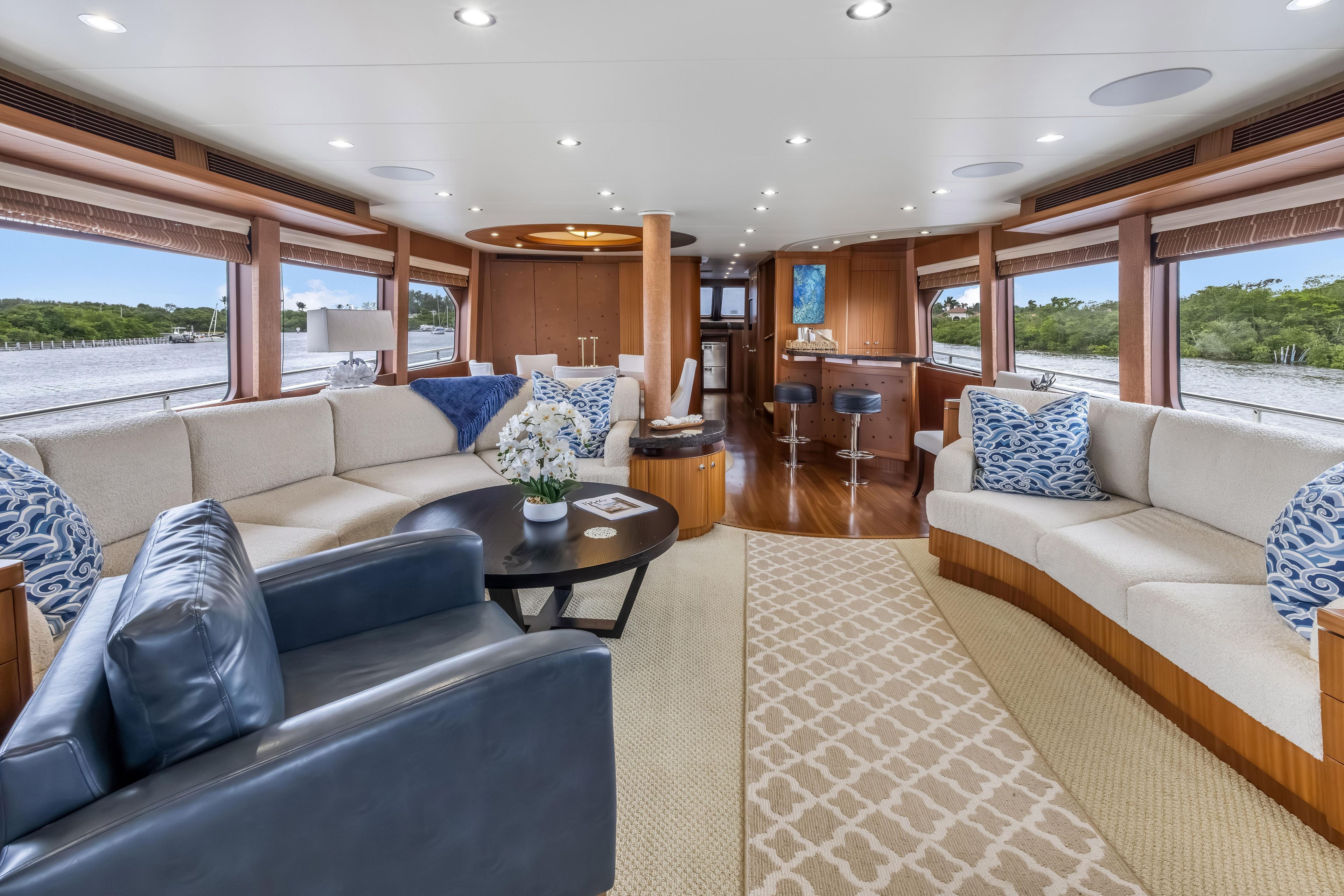 Luxurious interior of 2012 Cheoy Lee 84 Bravo yacht with elegant seating and decor.