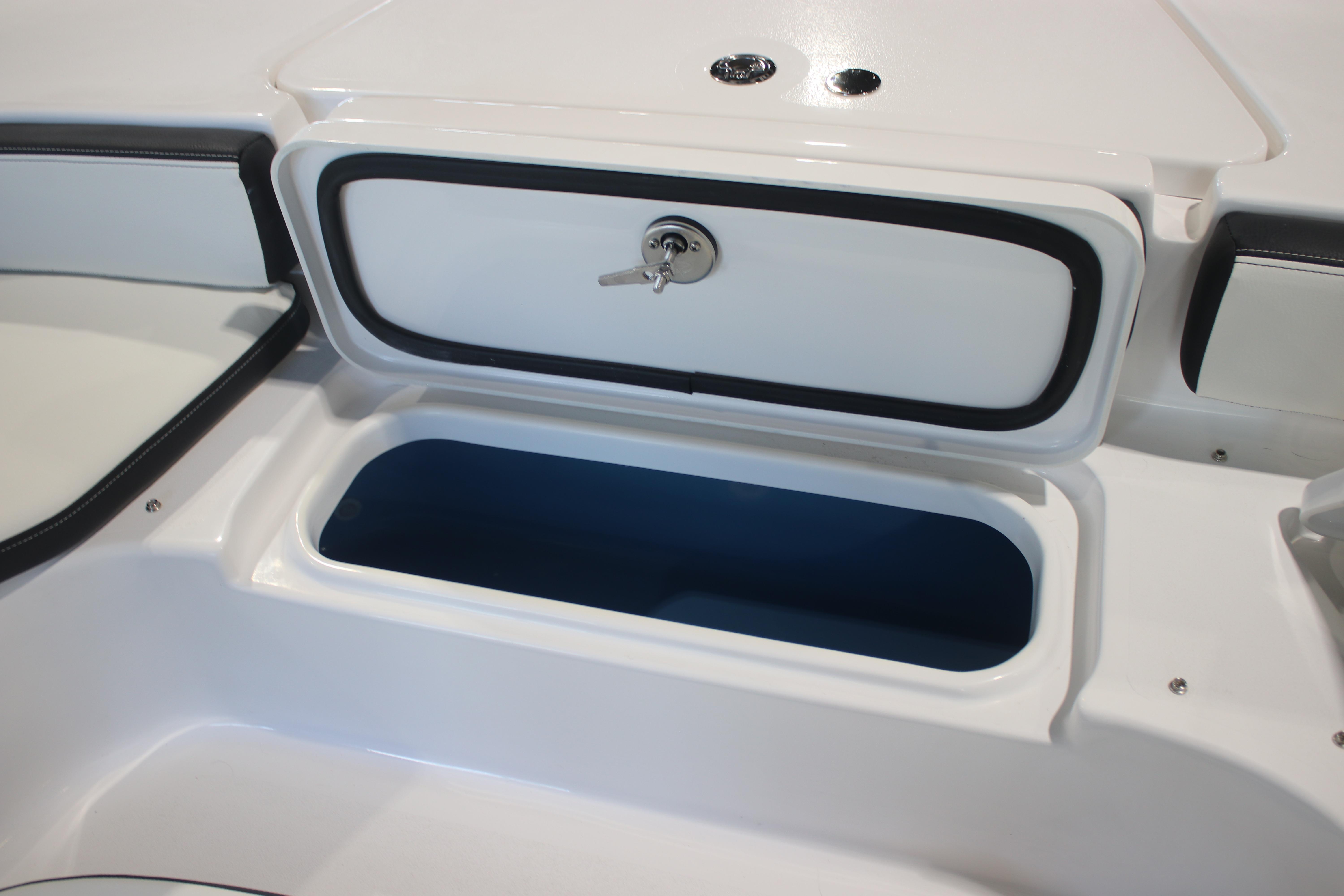 2026 Tidewater 2300 Carolina Bay boat storage compartment with secure lock.