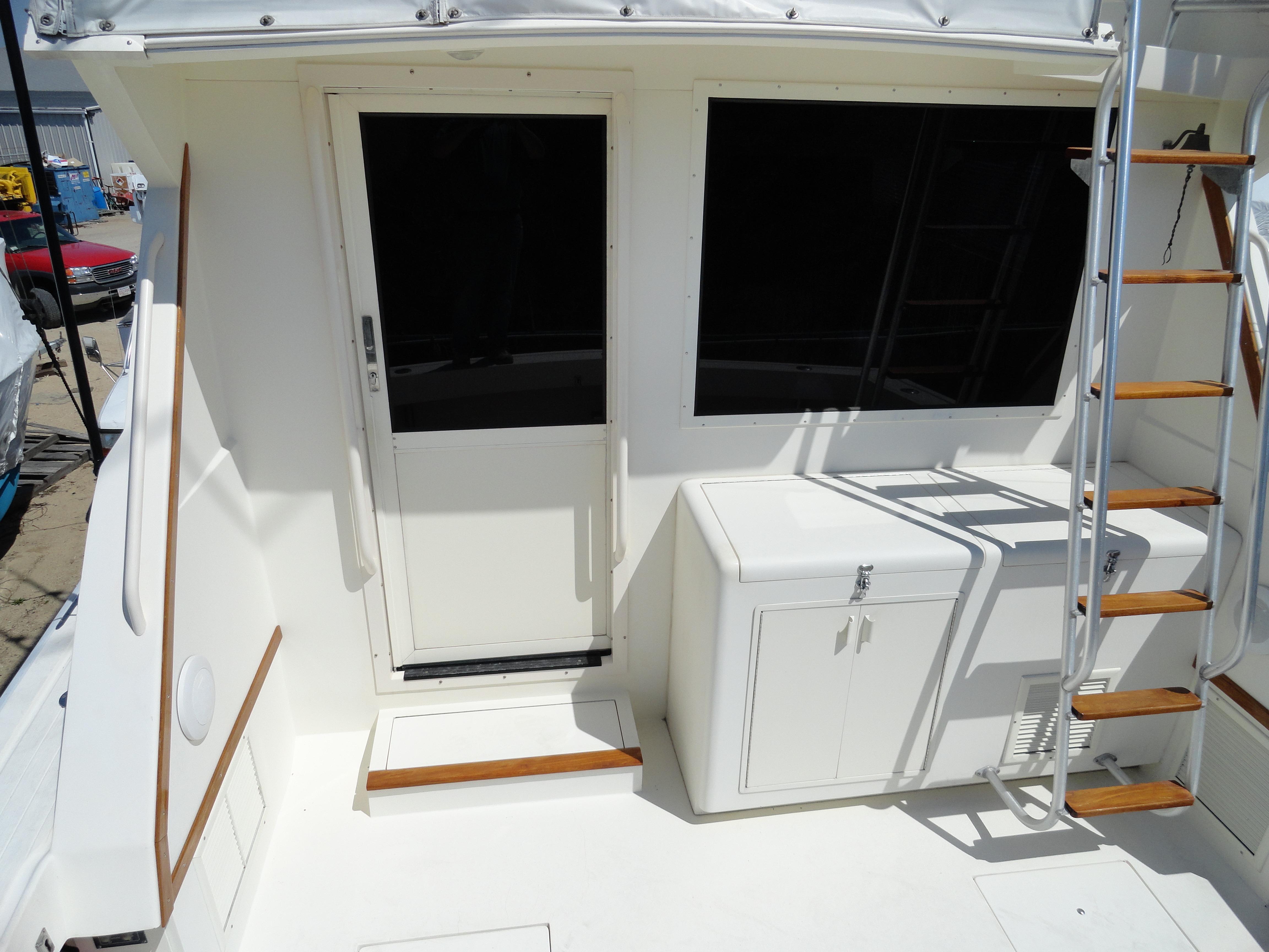 1989 Viking 41 Sportfish Convertible, rear view with stairs and door.